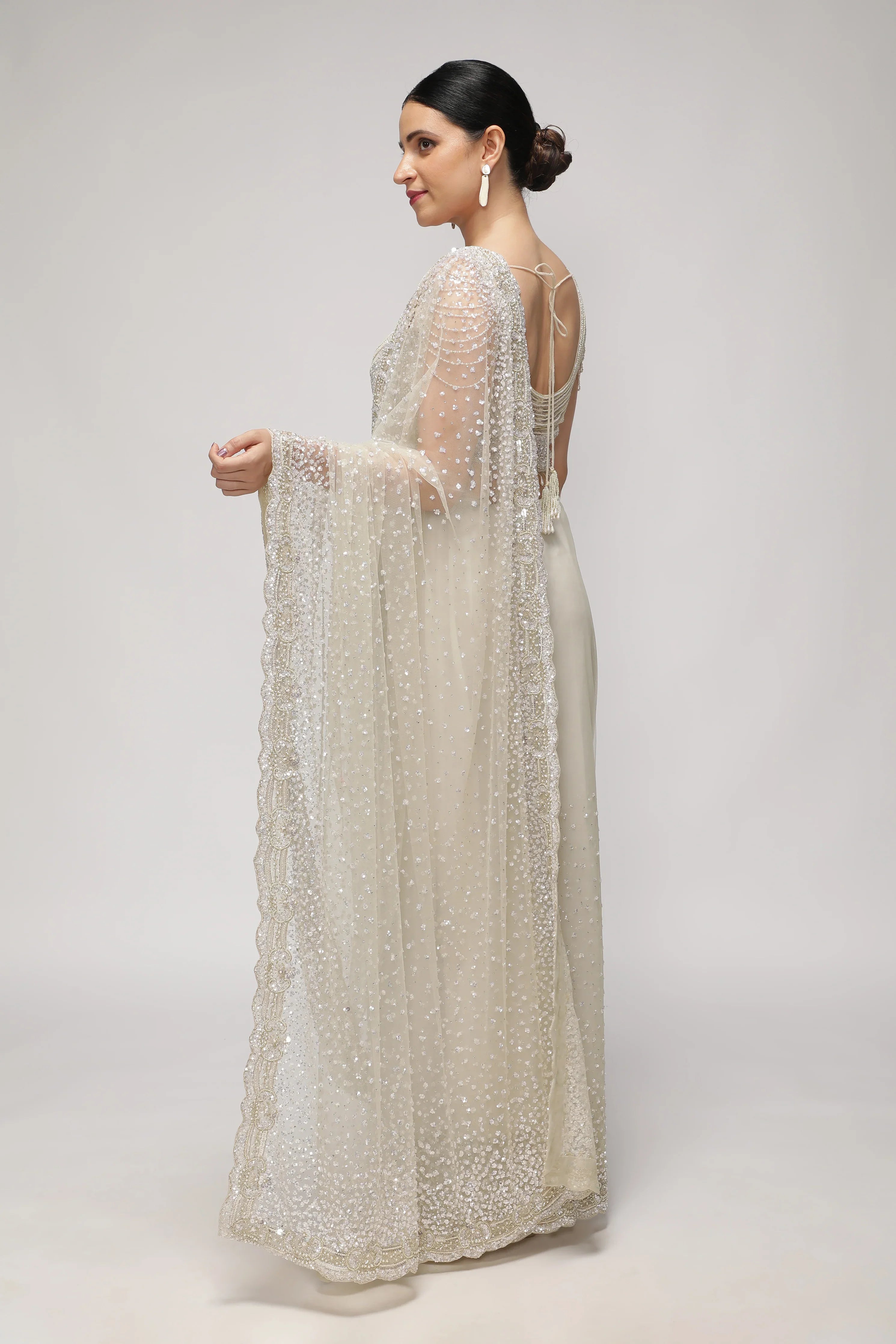 White Net Saree with All-Over Sequin & Pearl Scallop Border - Mokshaa
