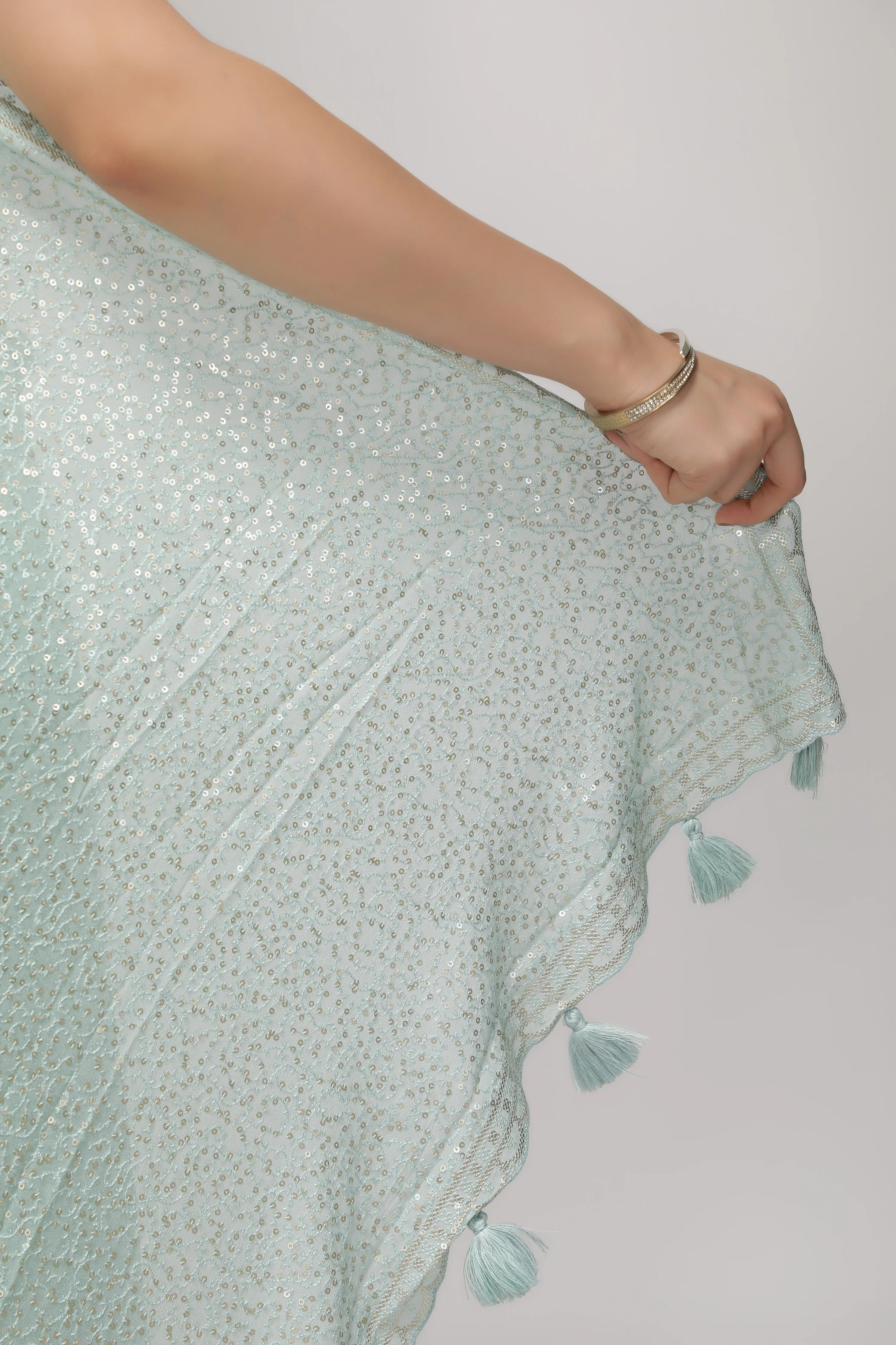 Sea Blue Georgette Saree with All-Over Sequins Body & Embroidered Border - Mokshaa