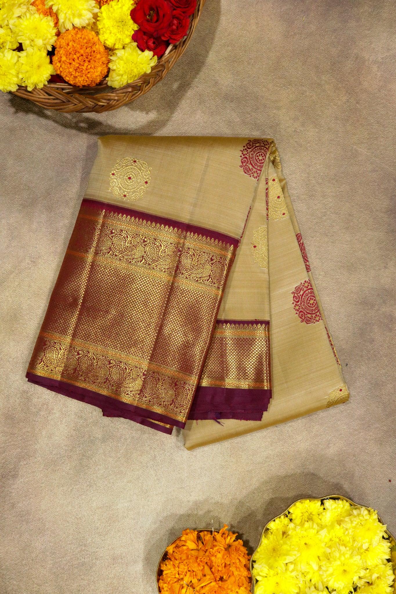 Beige Kanchipuram Silk Saree with Zari & Thread Motifs and Contrast Zari Border - Mokshaa