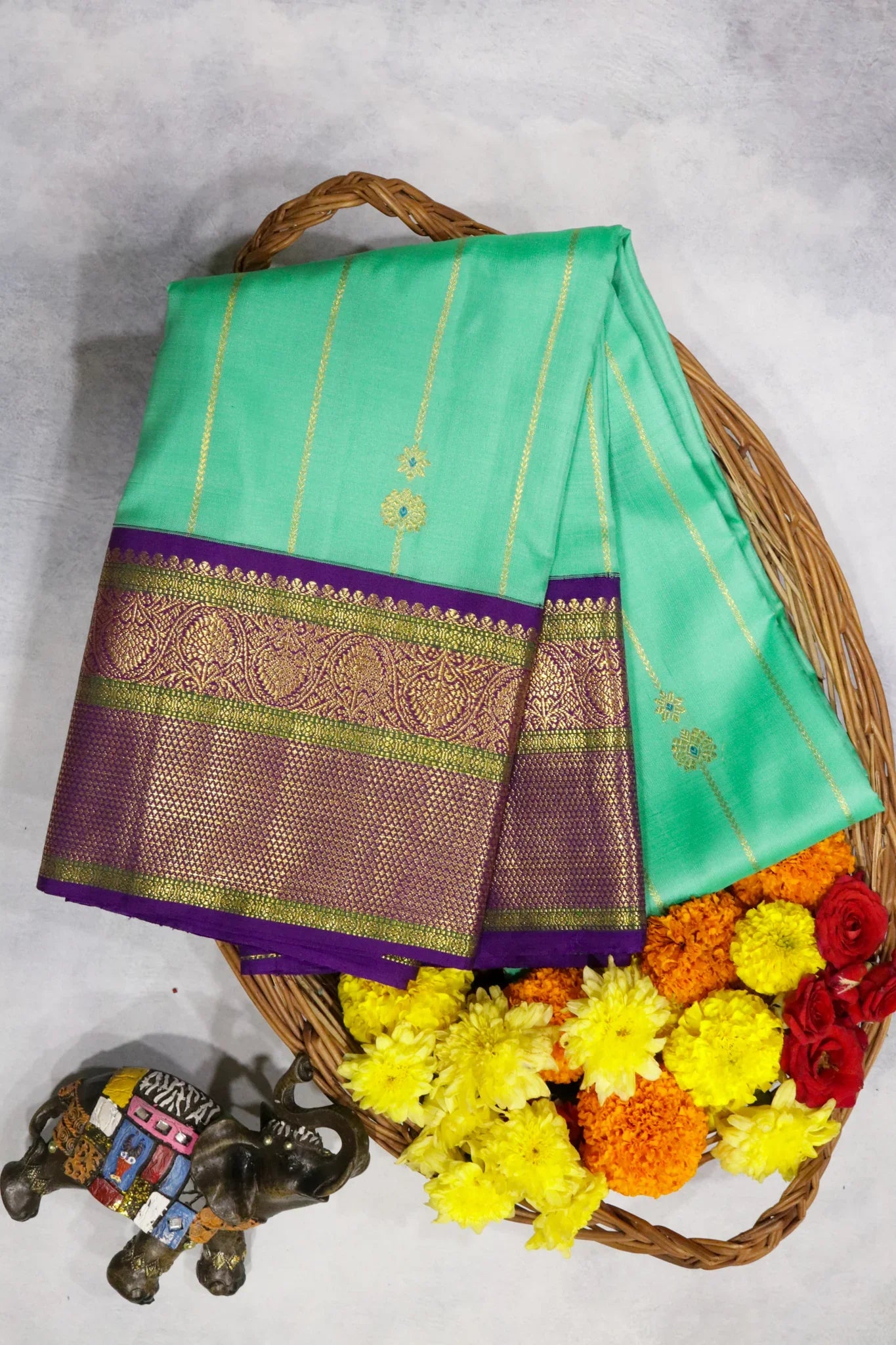 Turquoise Blue Kanchipuram Silk Saree with Zari Stripes, Buttas & Contrast Border - Mokshaa
