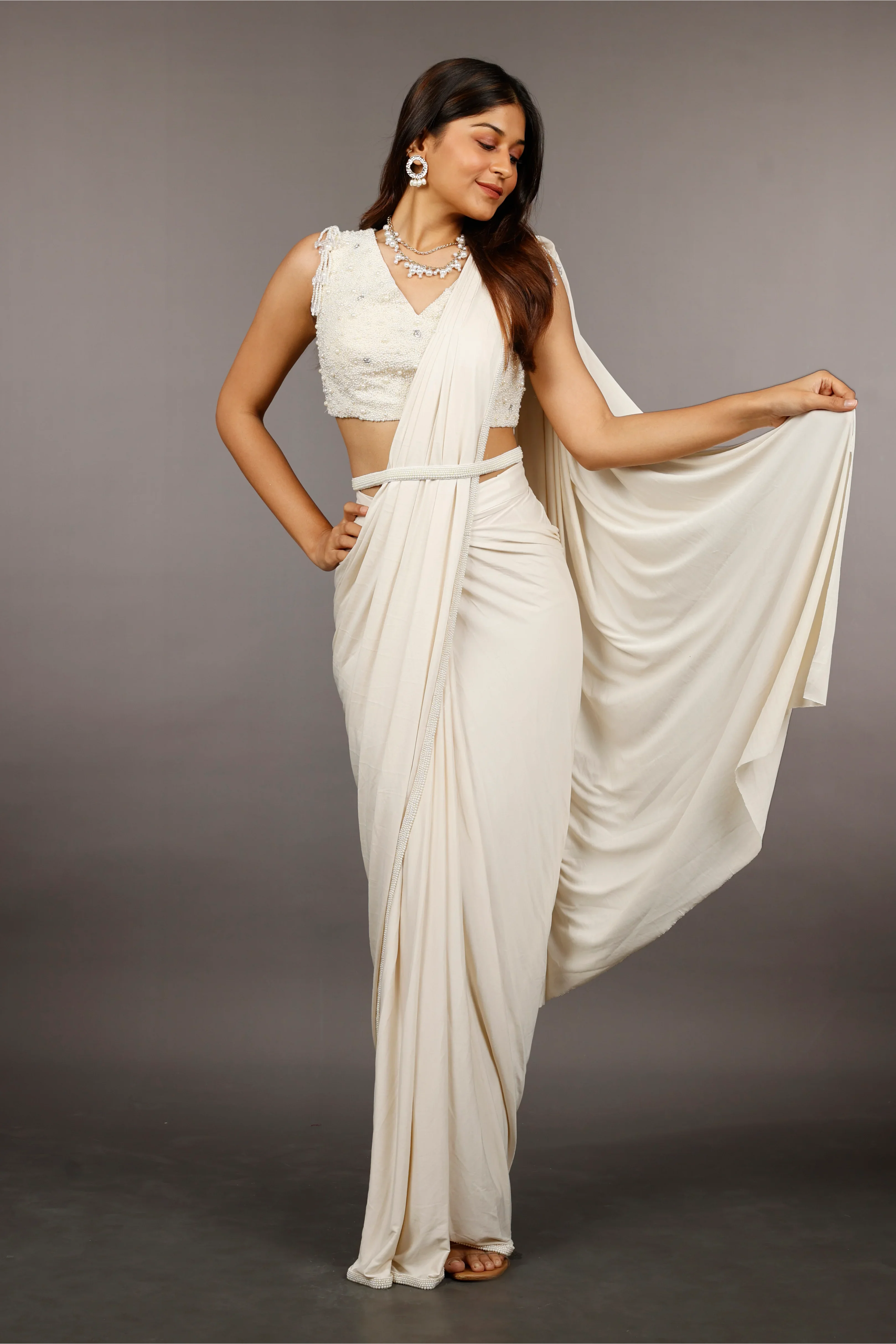 Ivory Lycra Drape Saree with Pearl & Stone Embroidered Blouse - Mokshaa