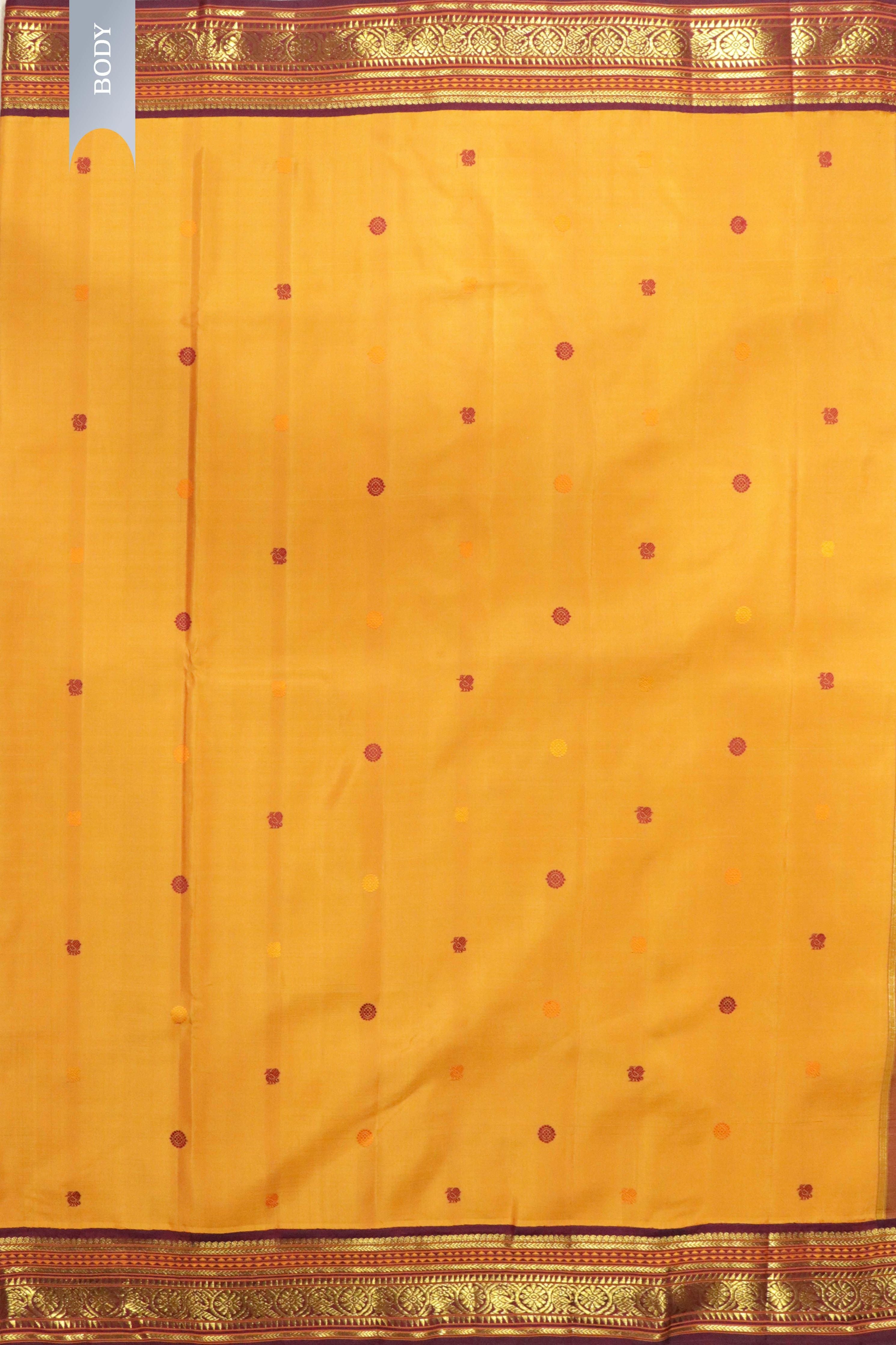 Pastel Orange Kanchipuram Silk Saree with Silk Thread Motifs & Contrast Zari Border - Mokshaa