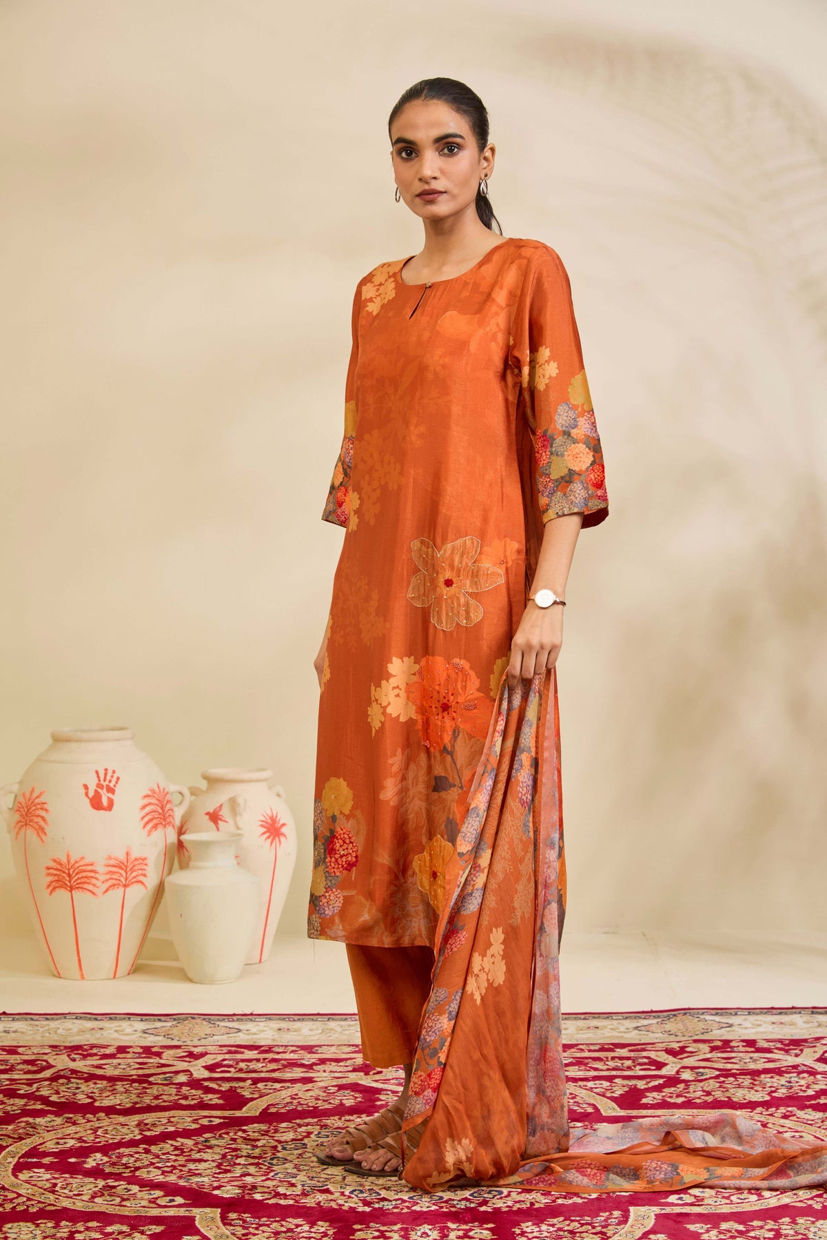 Burnt Orange Muslin Kurta Set with Floral Print and Embellishment - Mokshaa