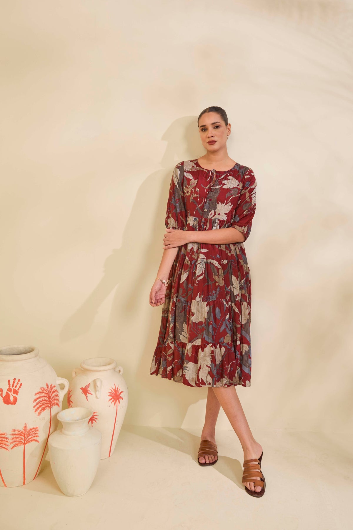 Maroon Printed Muslin Tiered Dress with Tassel Tie-Up Neckline - Mokshaa