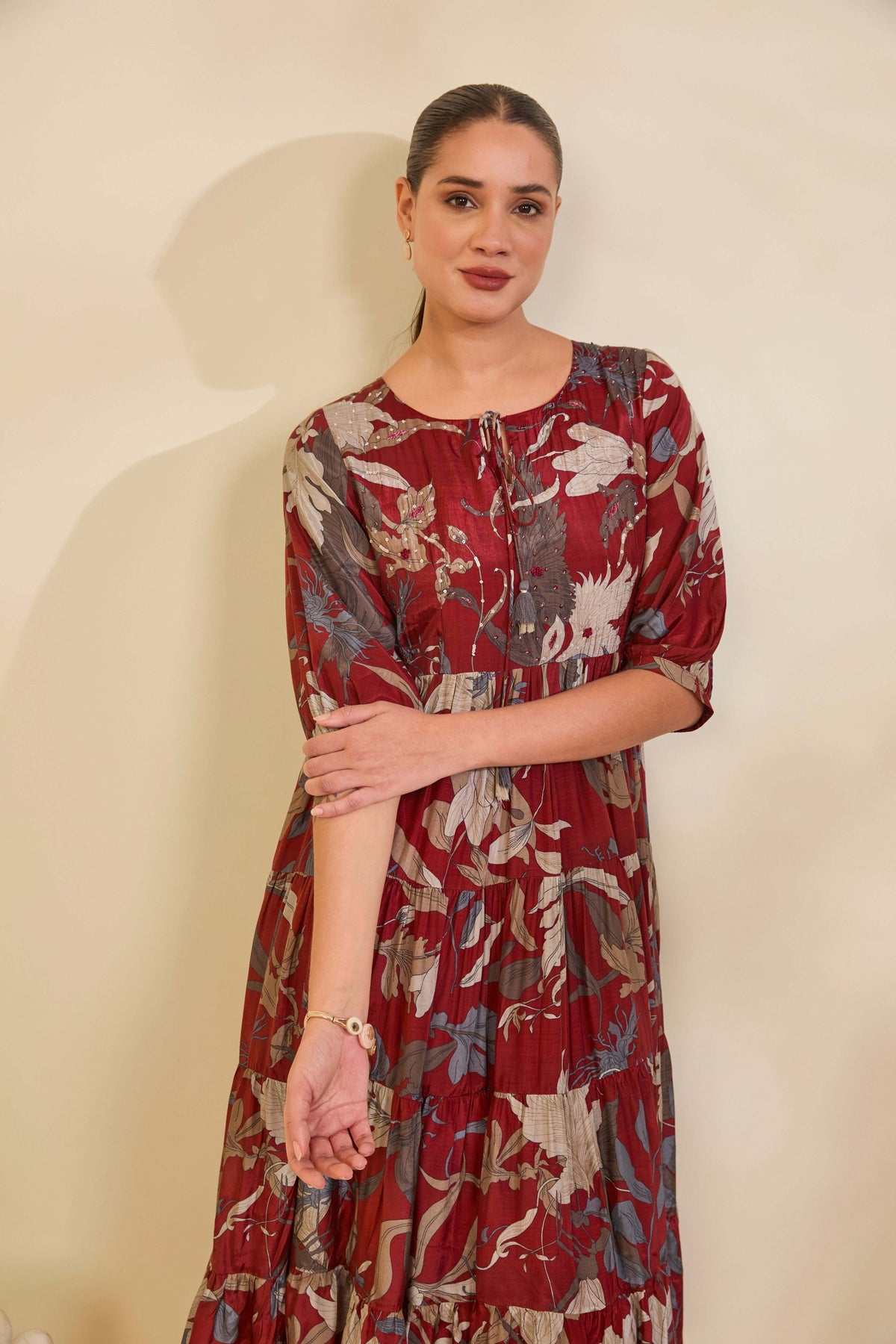 Maroon Printed Muslin Tiered Dress with Tassel Tie-Up Neckline - Mokshaa