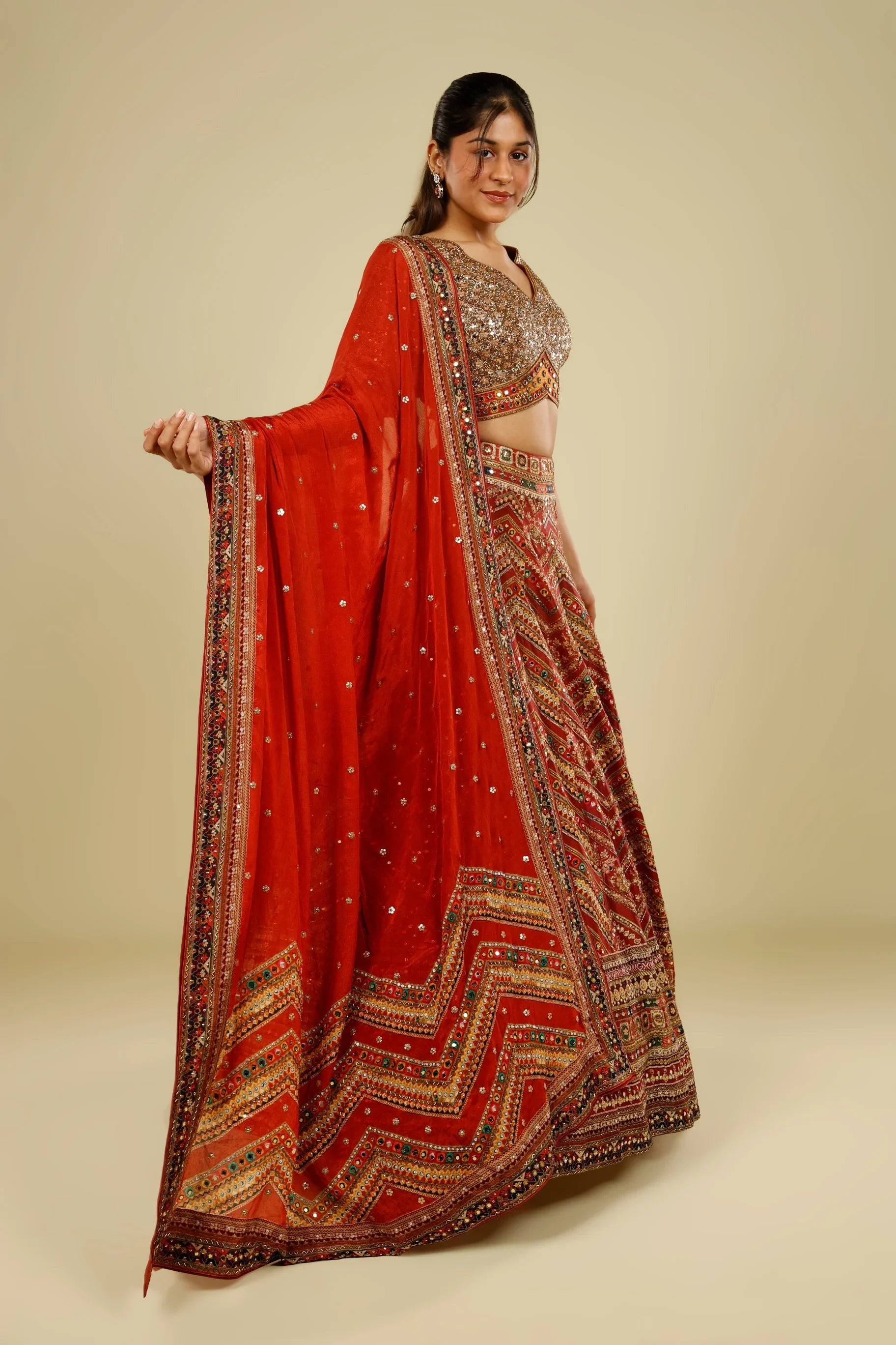 Rust Printed Silk Lehenga Set with Sequin & Kutdana Embroidery - Mokshaa