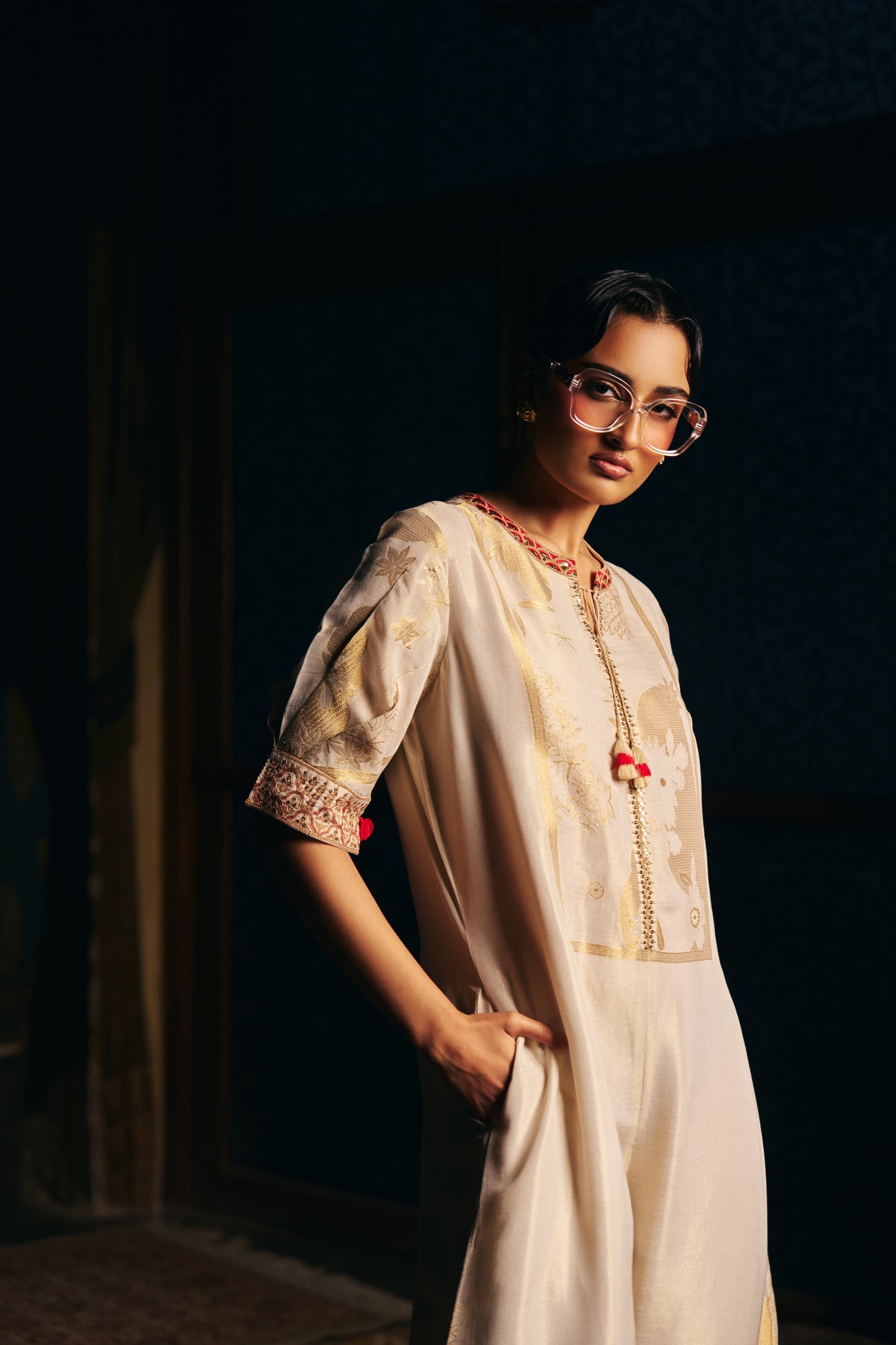 Ivory Banarasi Tissue Jumpsuit with Gold Woven Motifs and Embroidered Neckline - Mokshaa