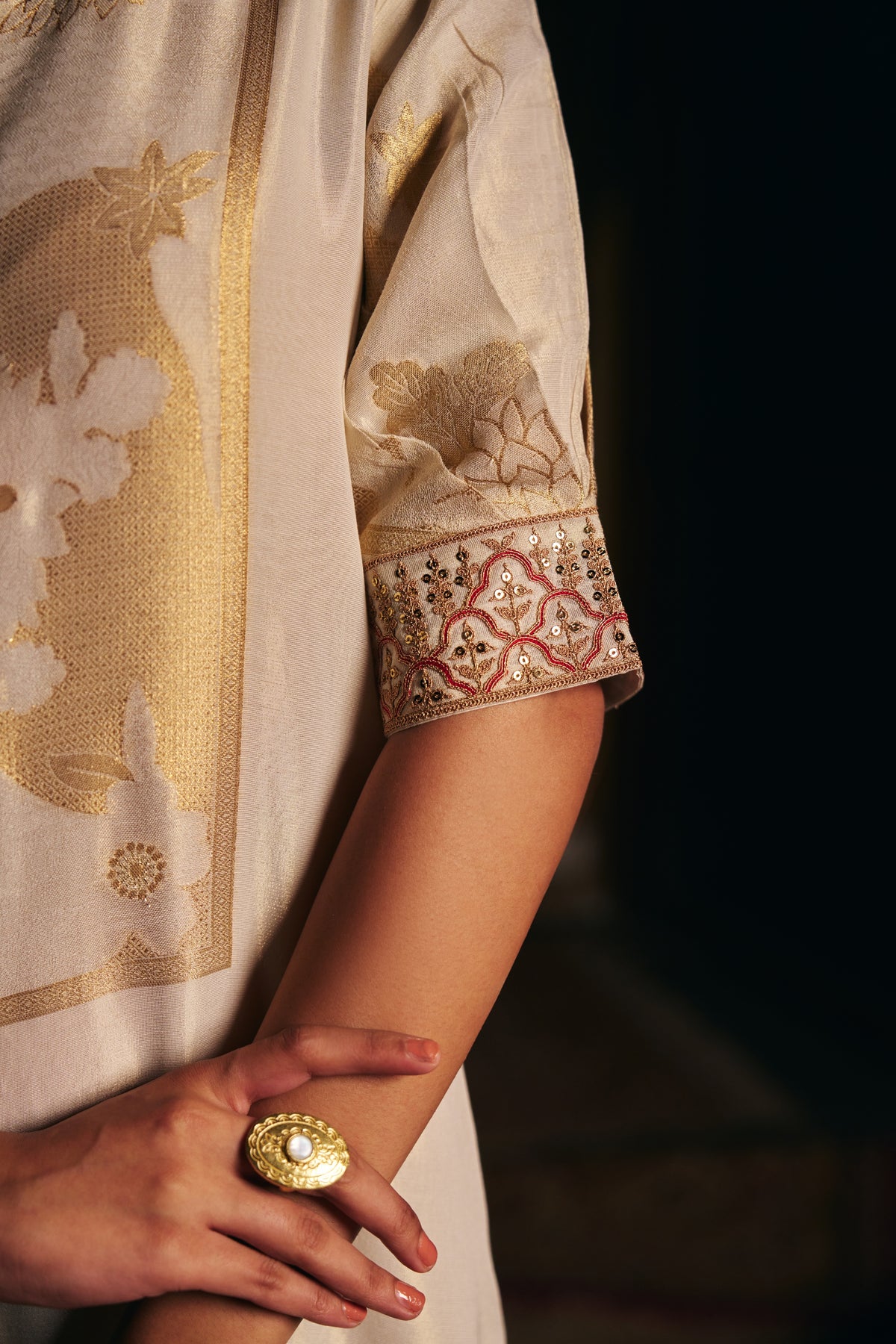 Ivory Banarasi Tissue Jumpsuit with Gold Woven Motifs and Embroidered Neckline - Mokshaa