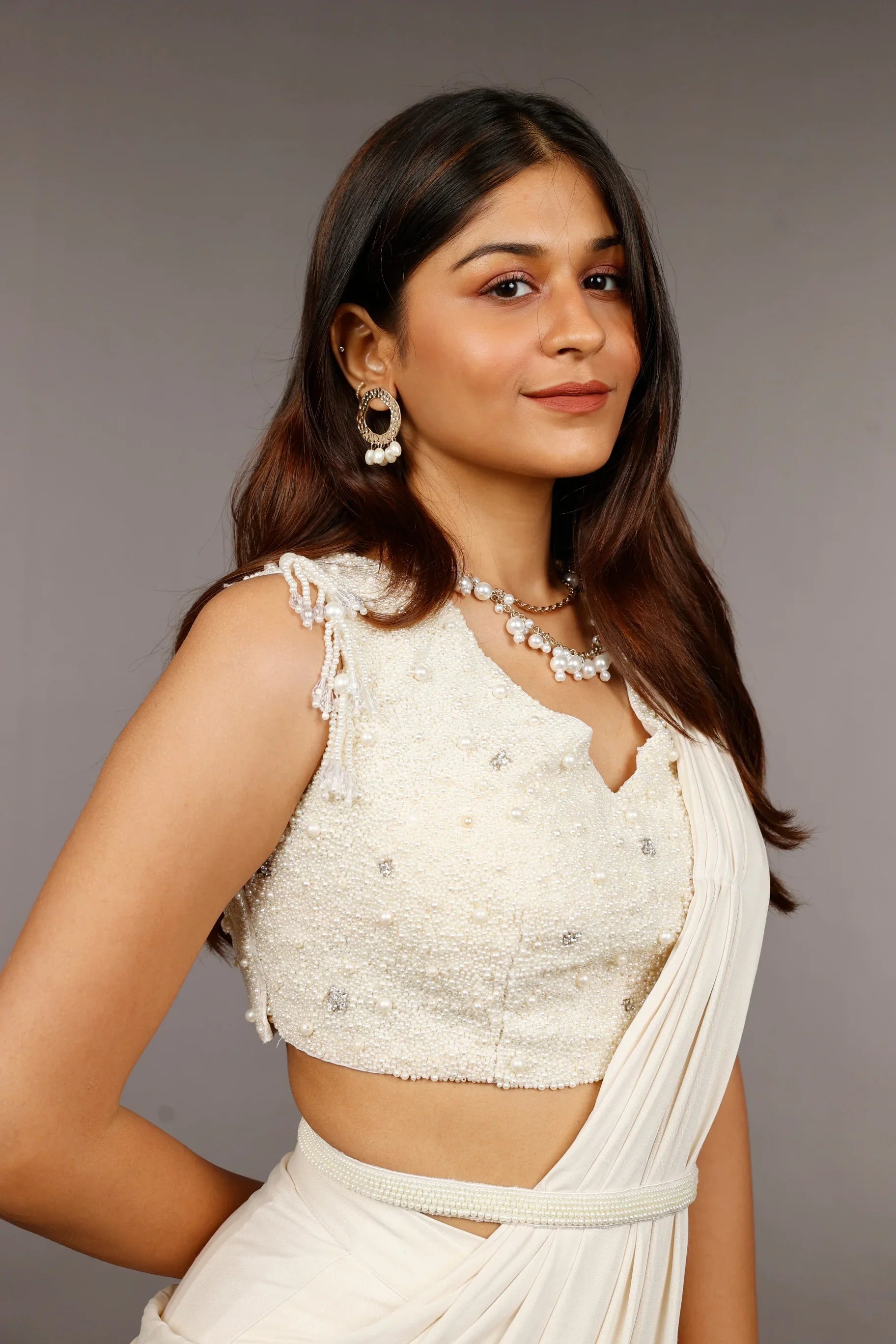 Ivory Lycra Drape Saree with Pearl & Stone Embroidered Blouse - Mokshaa