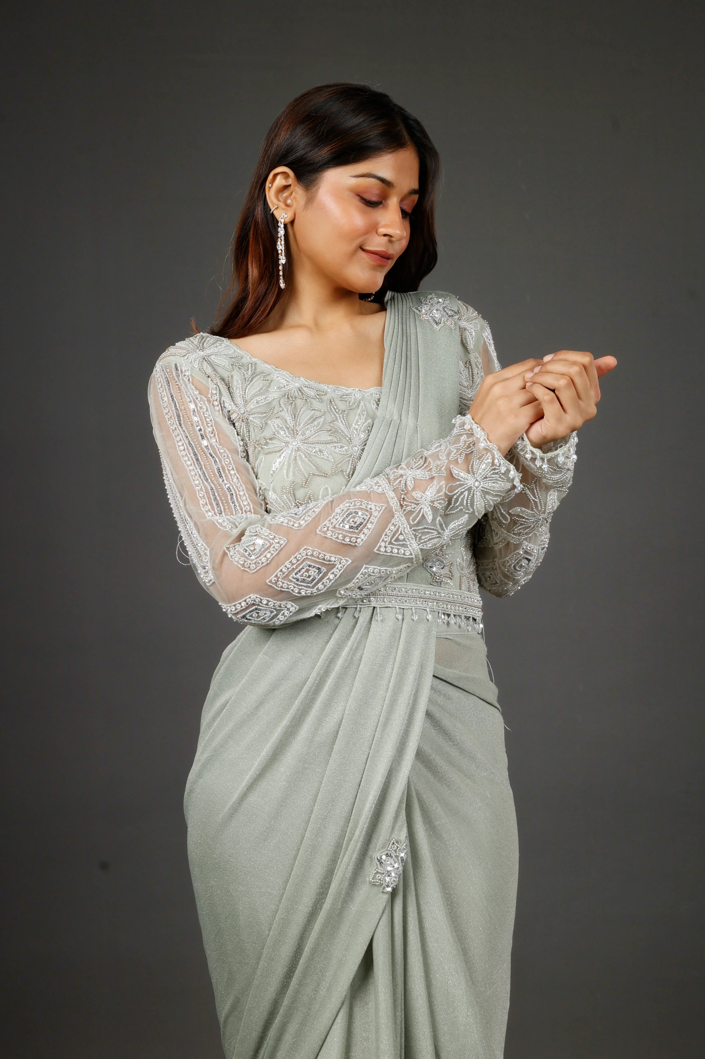 Sage Green Shimmer Drape Saree with Kutdana & Pearl Embroidery - Mokshaa
