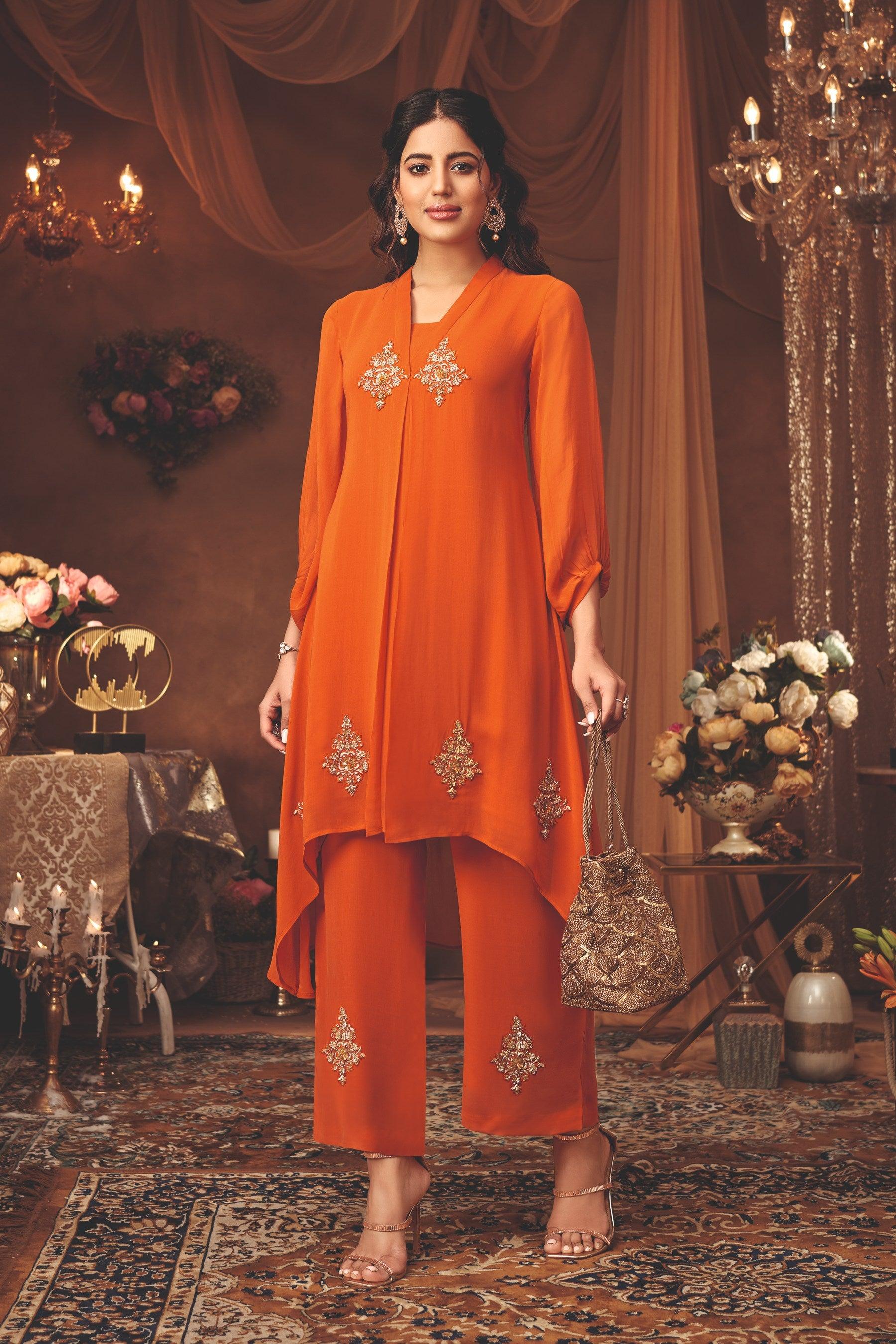 Burnt Orange Asymmetrical Kurta Set With Embellished Palazzo - Mokshaa