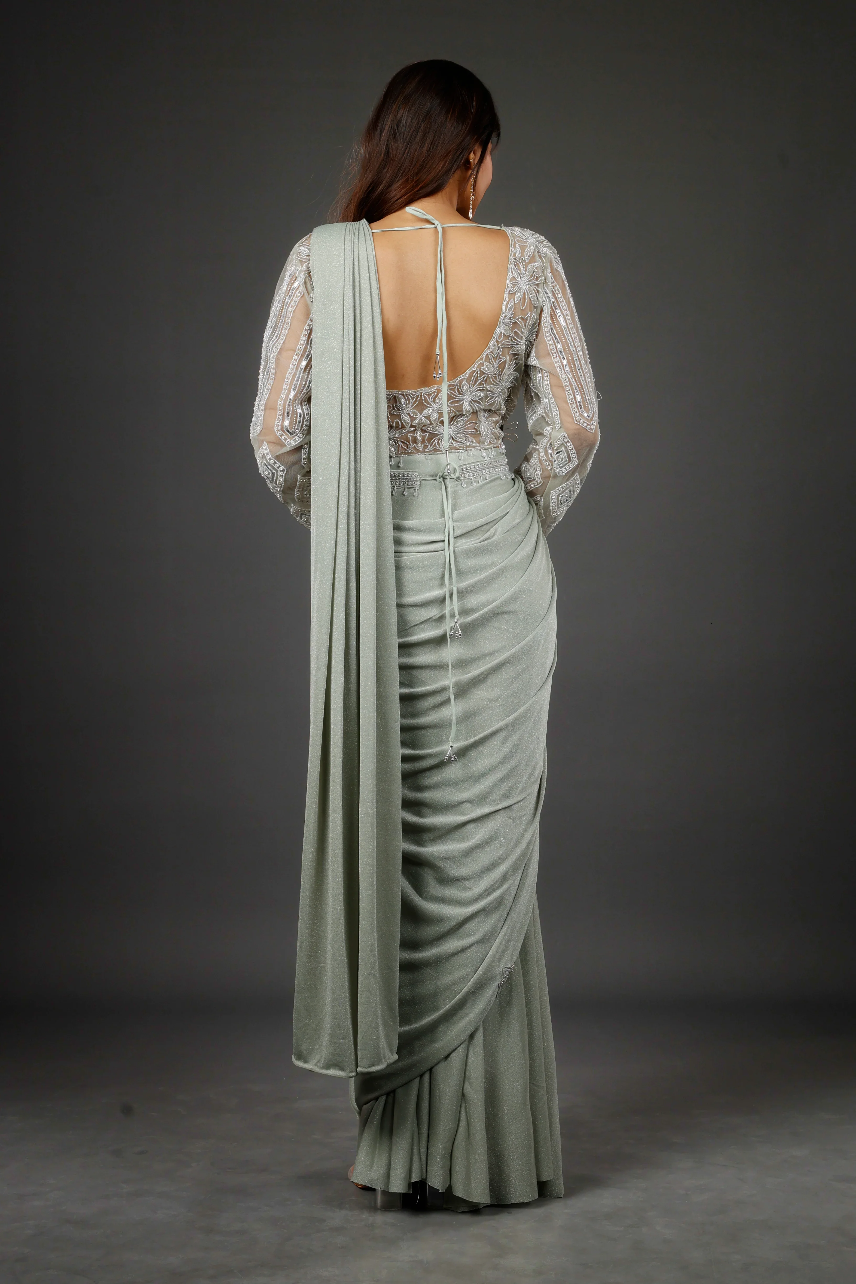 Sage Green Shimmer Drape Saree with Kutdana & Pearl Embroidery - Mokshaa
