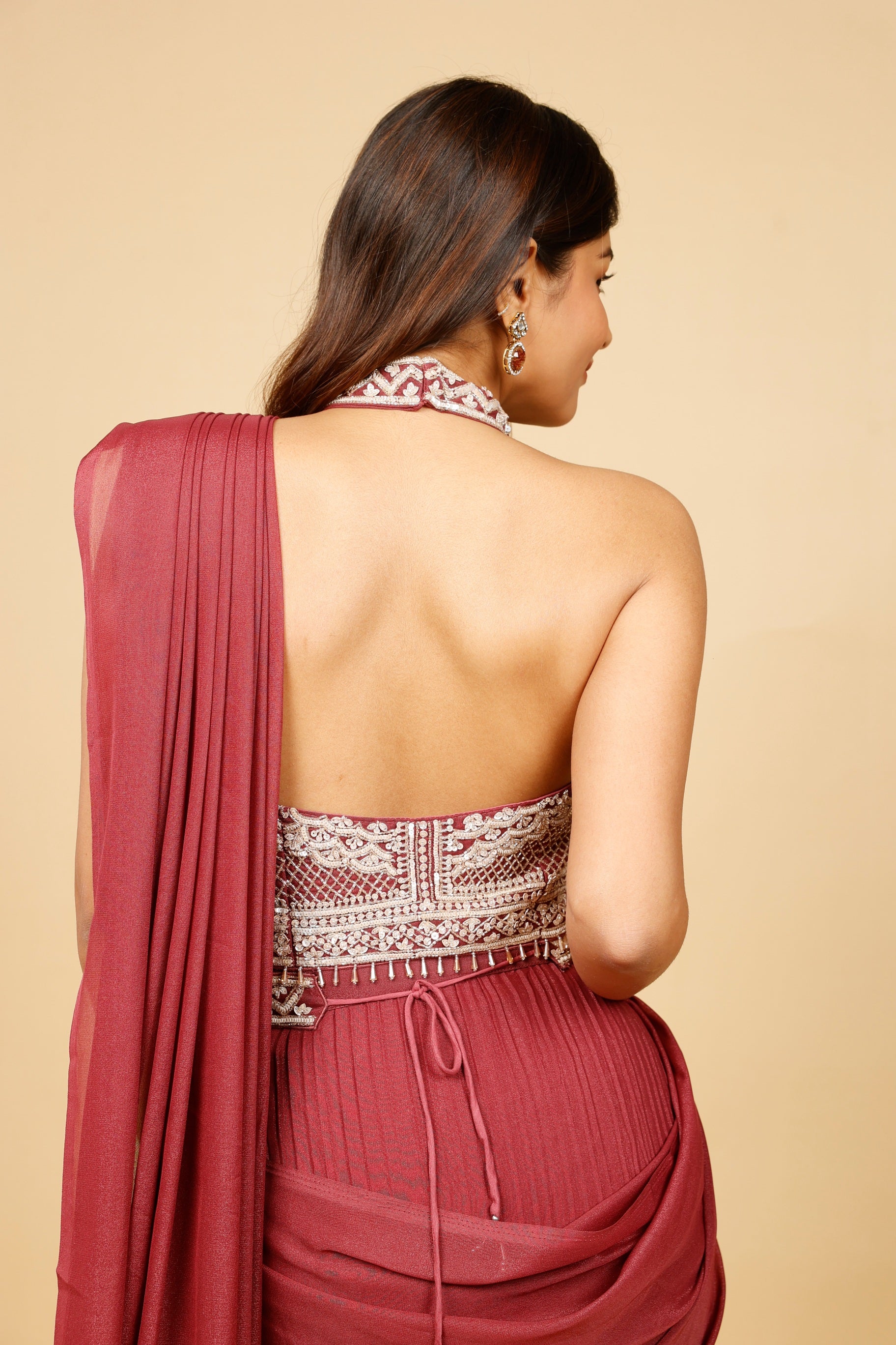 Maroon Embellished Drape Saree Set with Halter Neck Blouse & Pearl Detailing - Mokshaa