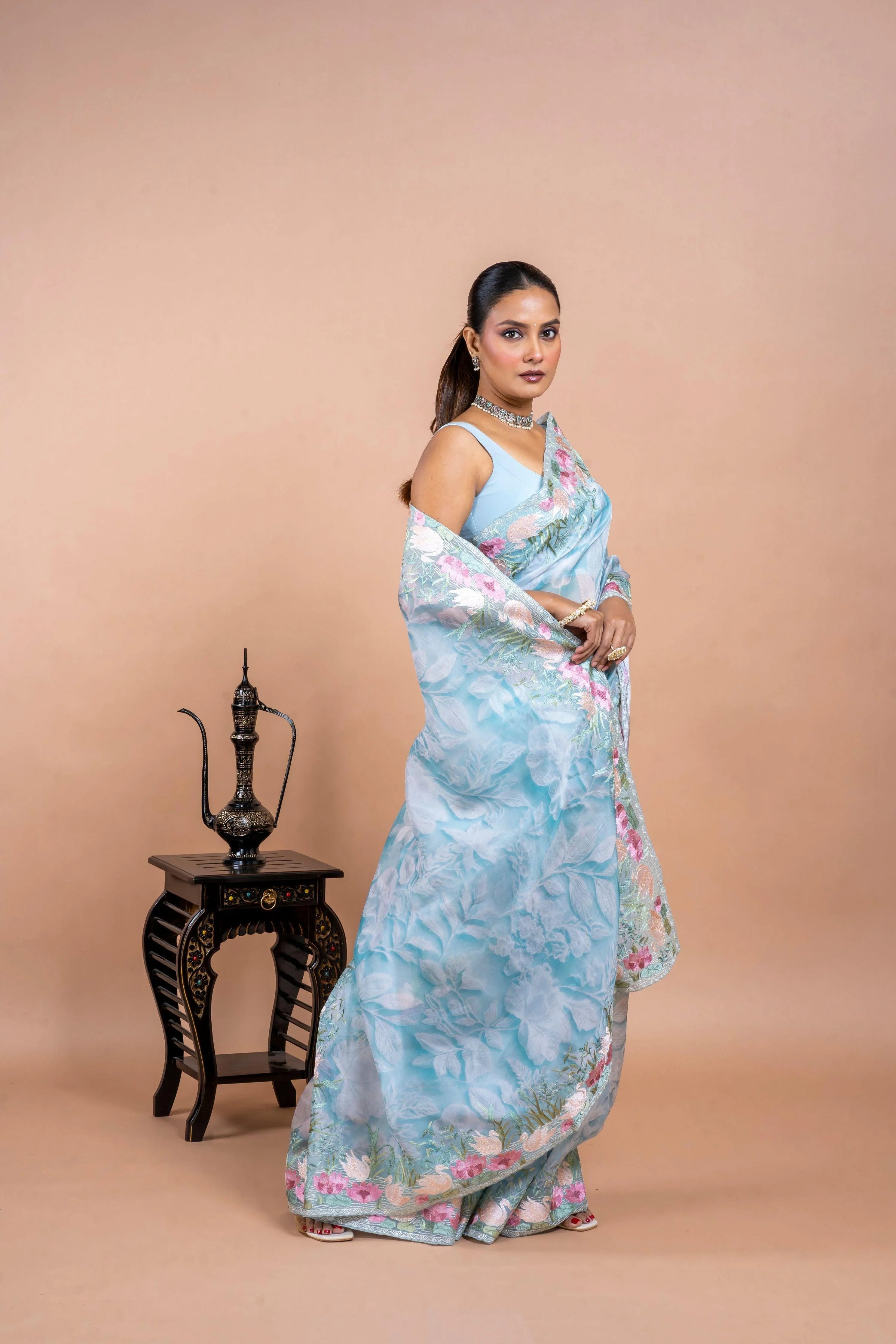 Sea Blue Organza Saree with Printed Body and Zari Border - Mokshaa
