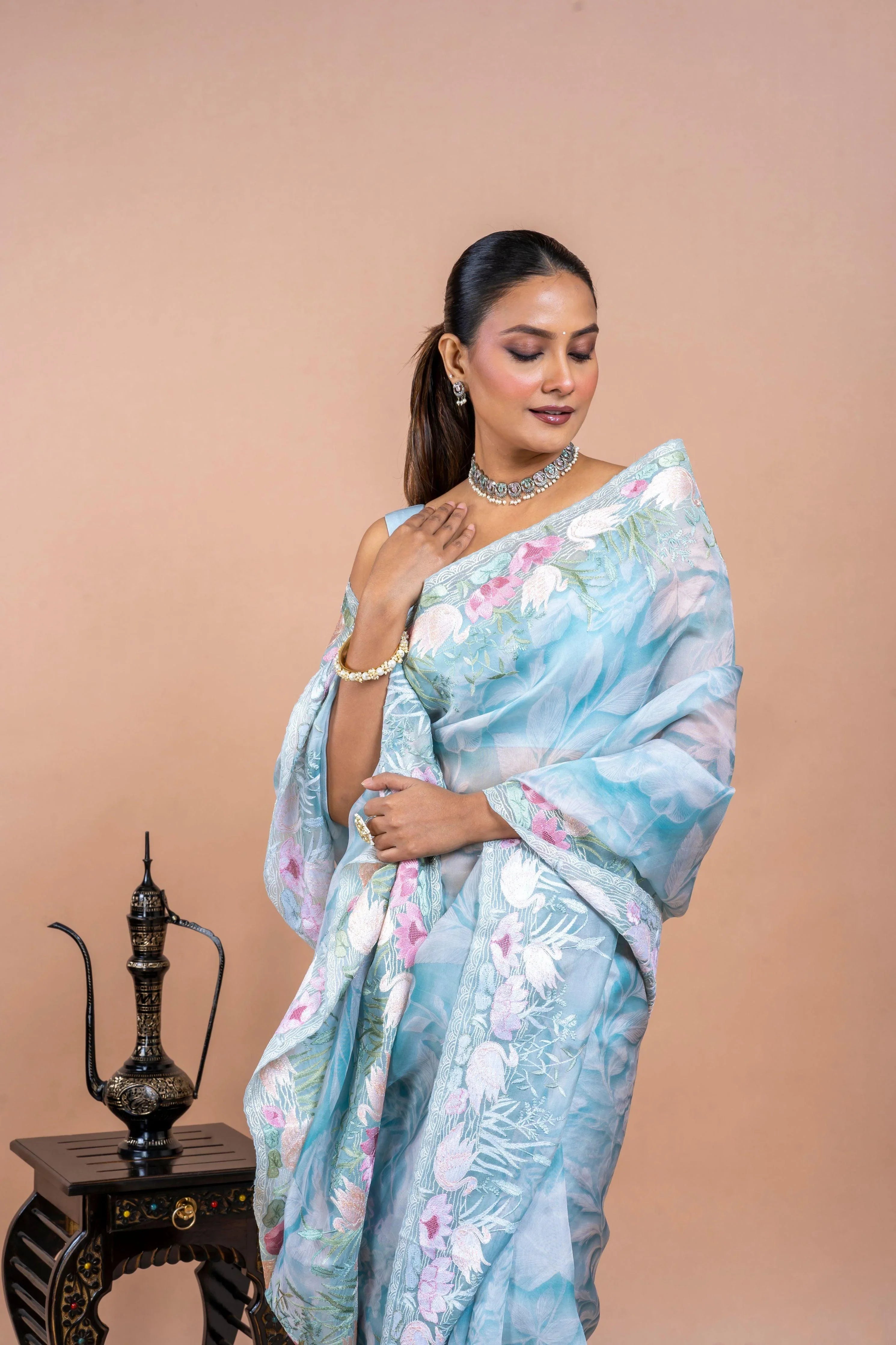 Sea Blue Organza Saree with Printed Body and Zari Border - Mokshaa