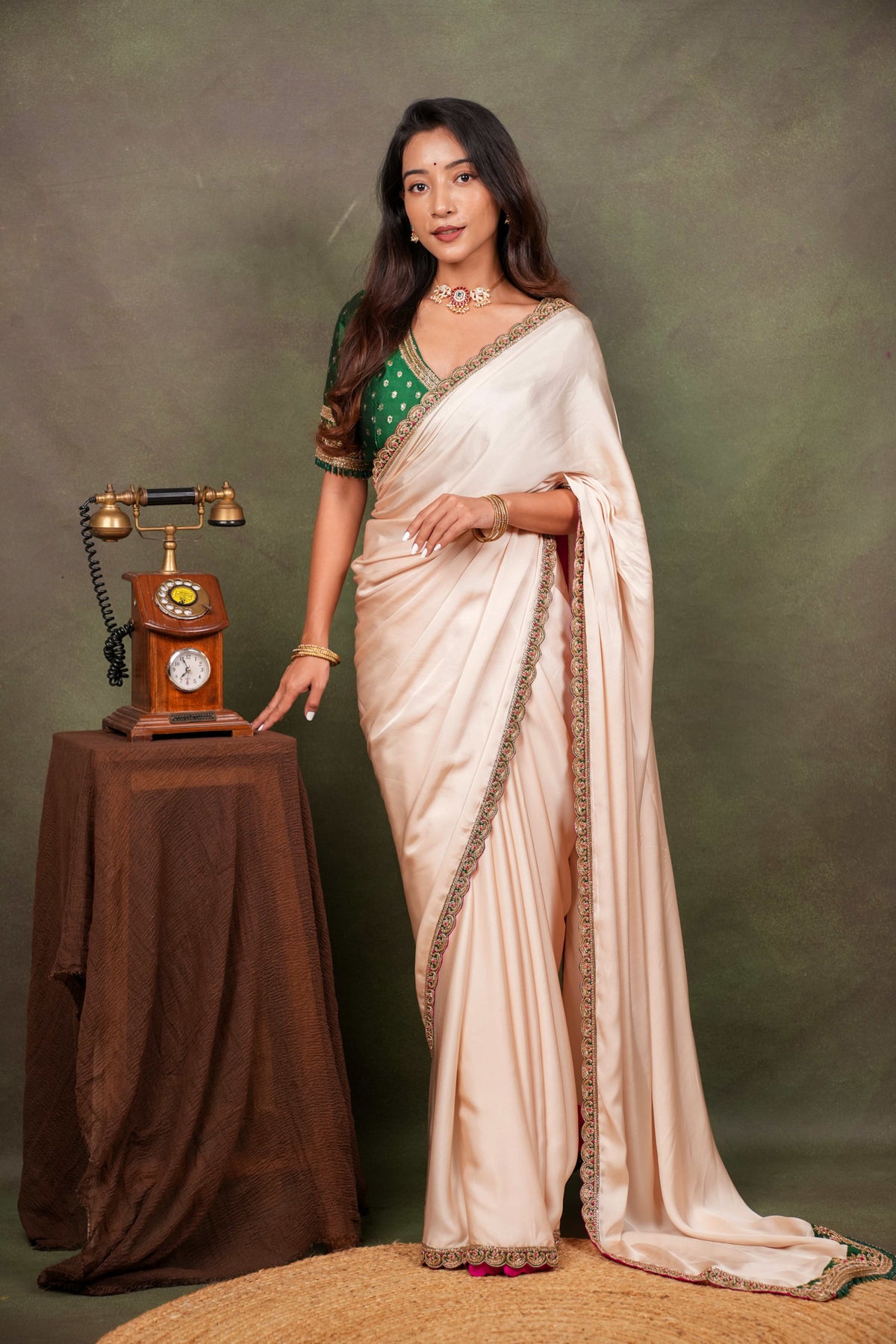 Peach Satin Saree with Green Embroidered Border