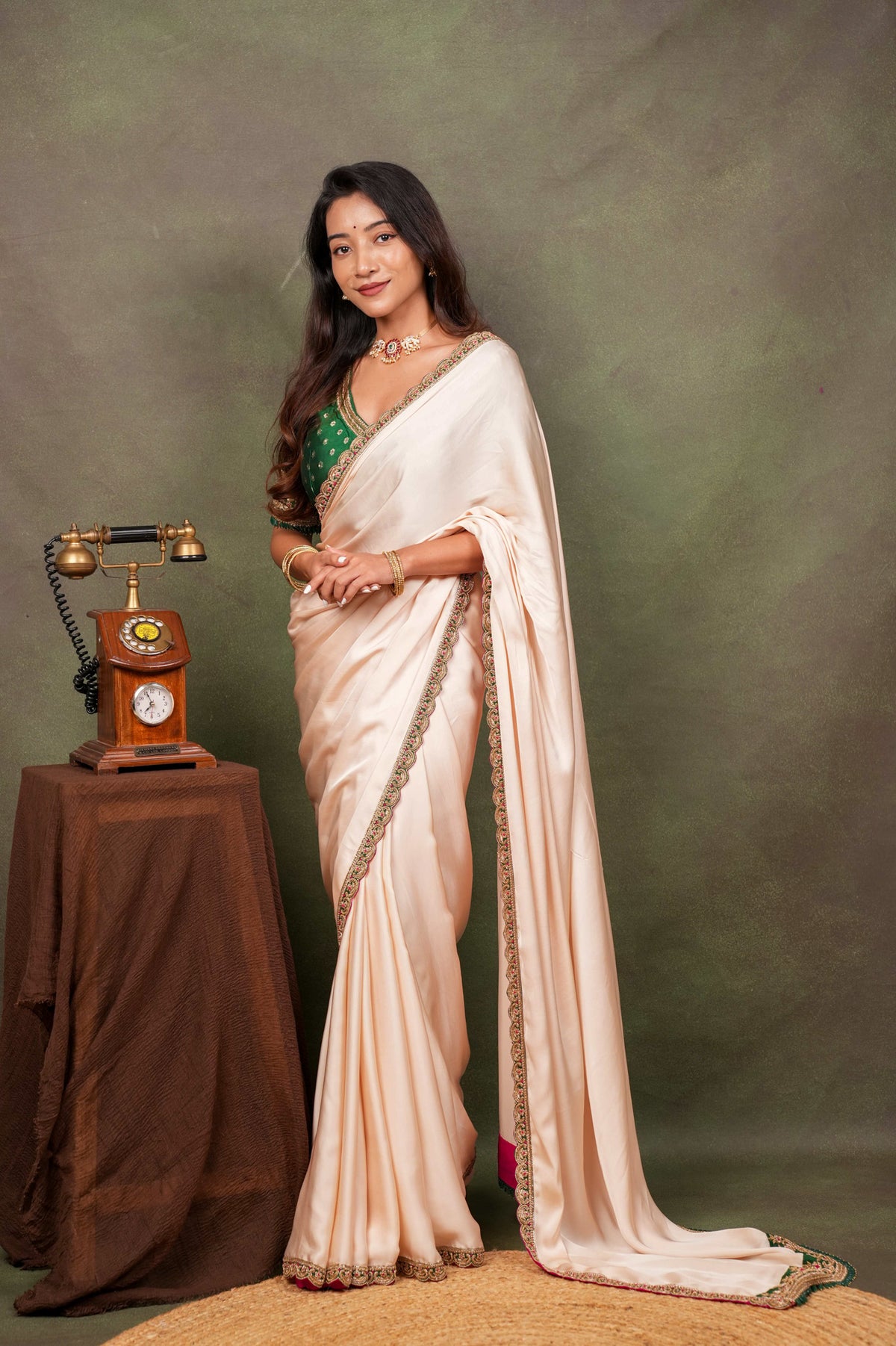 Peach Satin Saree with Green Embroidered Border