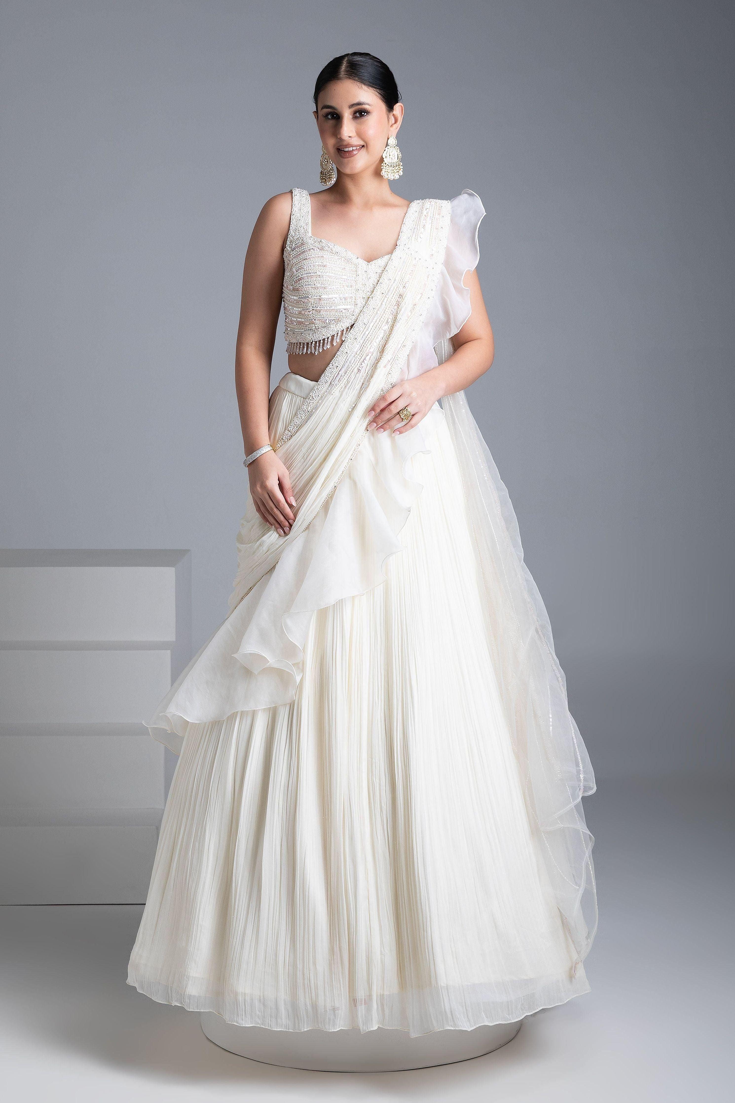 Ivory Georgette Pleated Lehenga Set With Bead And Pearl Embroidered Blouse - Mokshaa