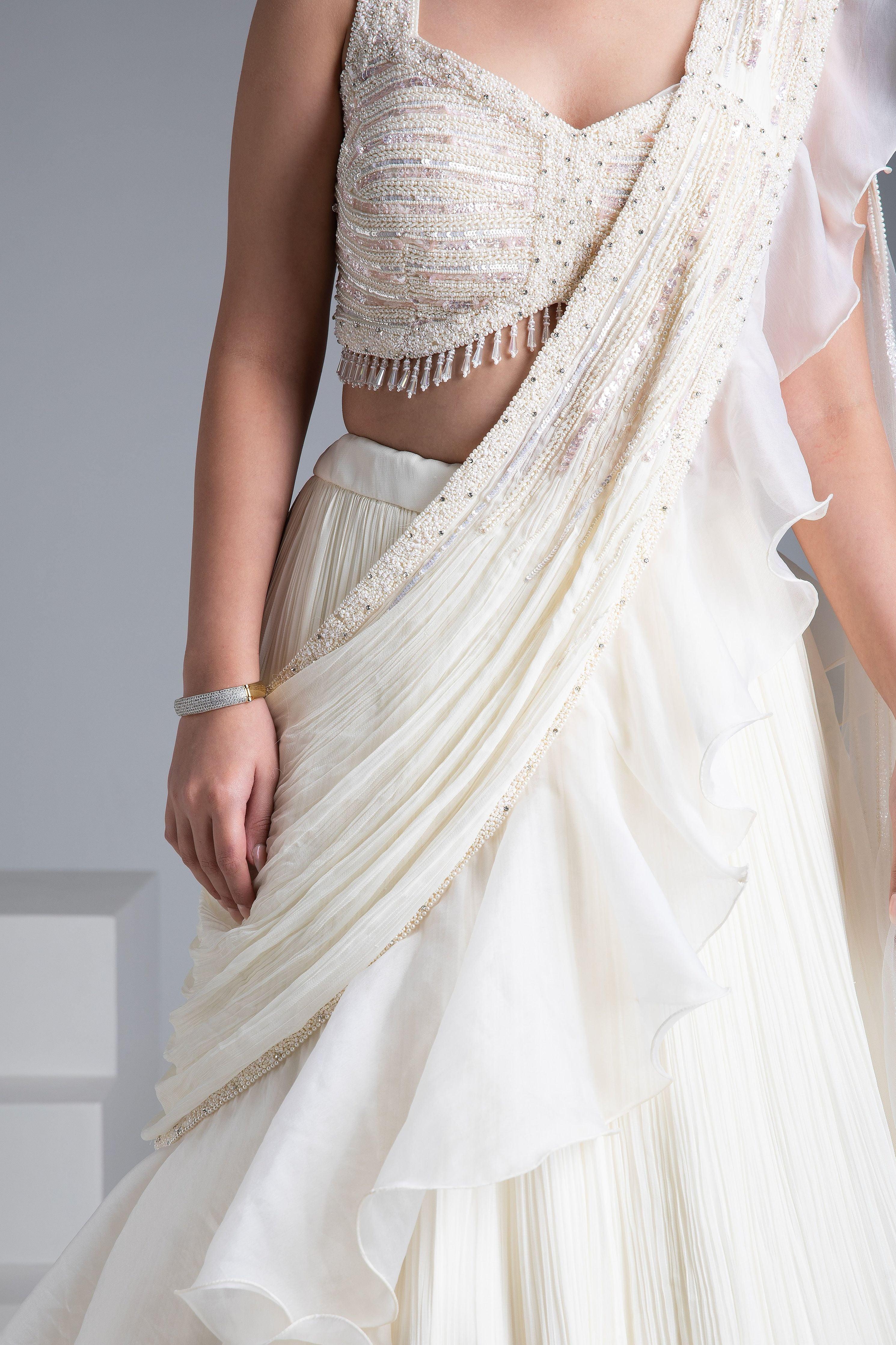 Ivory Georgette Pleated Lehenga Set With Bead And Pearl Embroidered Blouse - Mokshaa