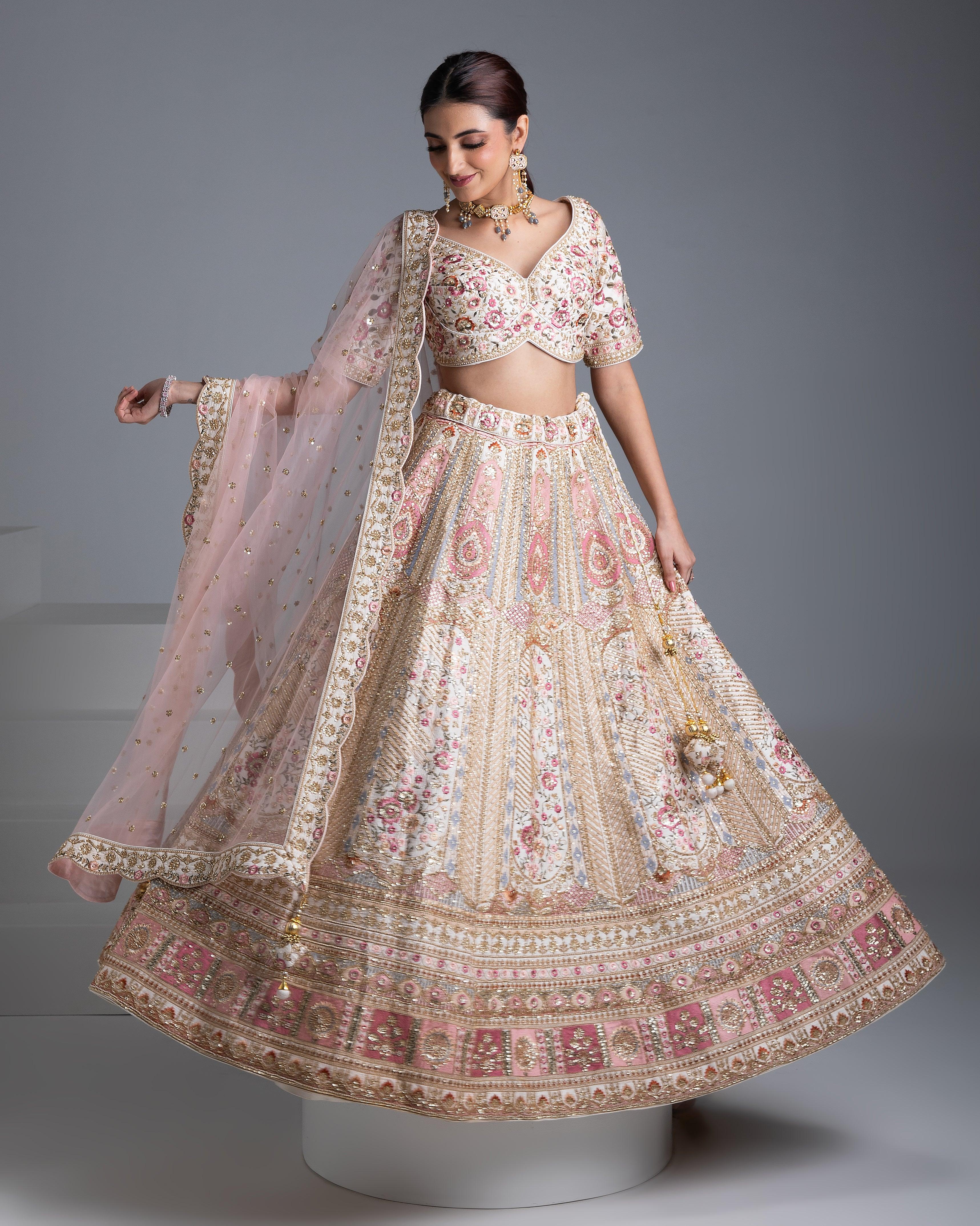 Beige Silk Lehenga With Gold Accents And Blush Pink Dupatta - Mokshaa