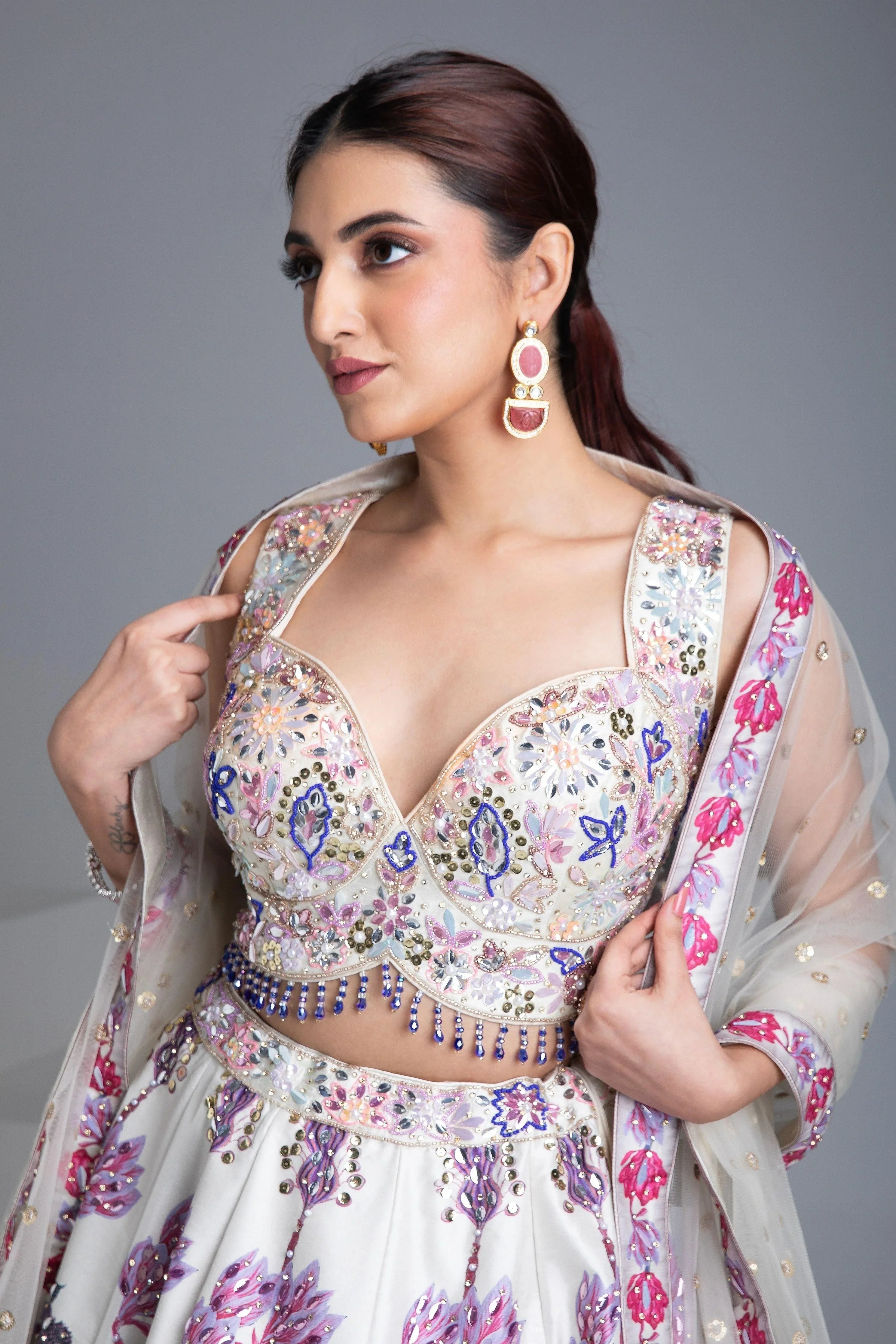 Ivory Silk Lehenga With Multicolor Floral Embroidery And Net Dupatta - Mokshaa