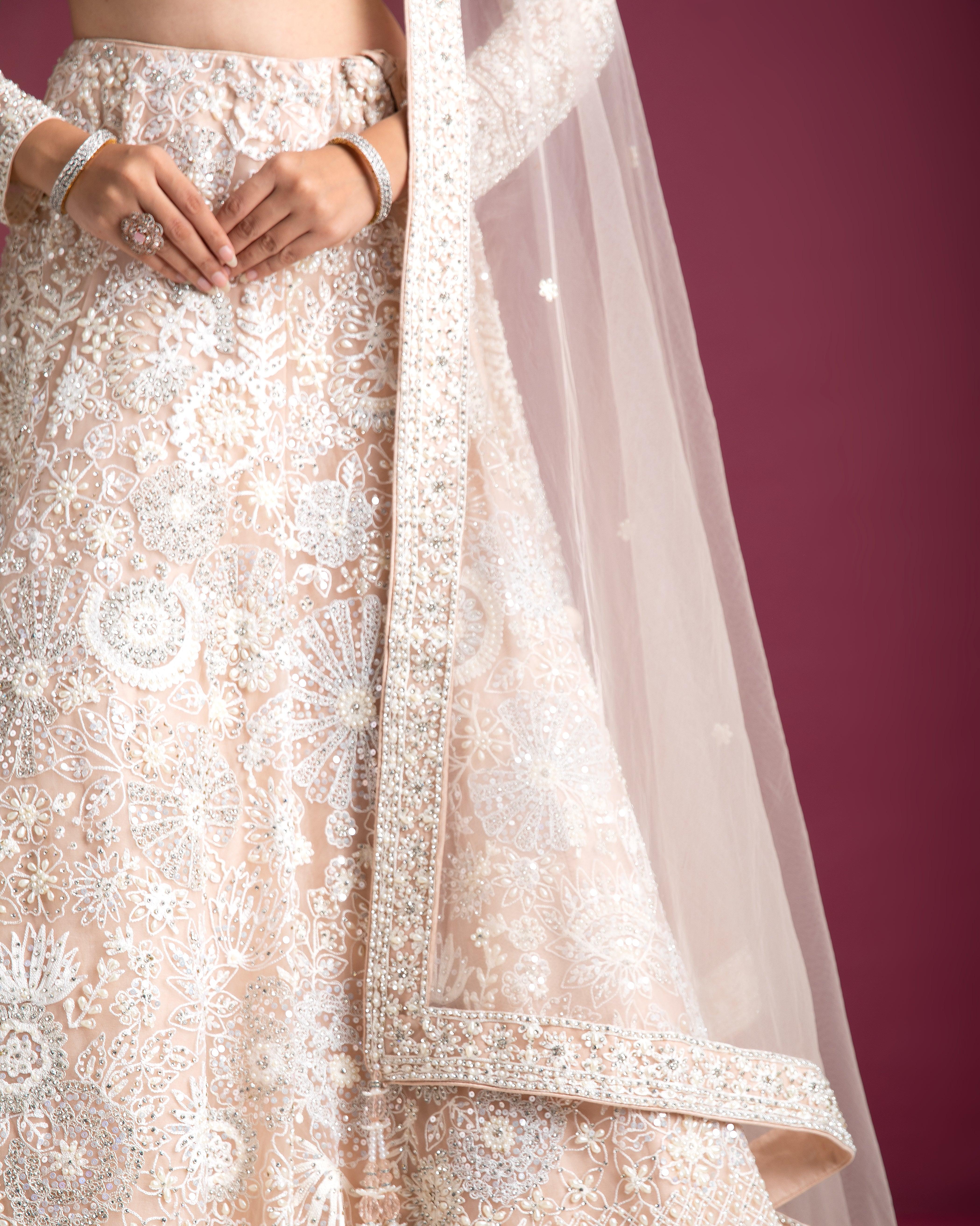 Peach Embellished Bridal Lehenga With Intricate Threadwork - Mokshaa