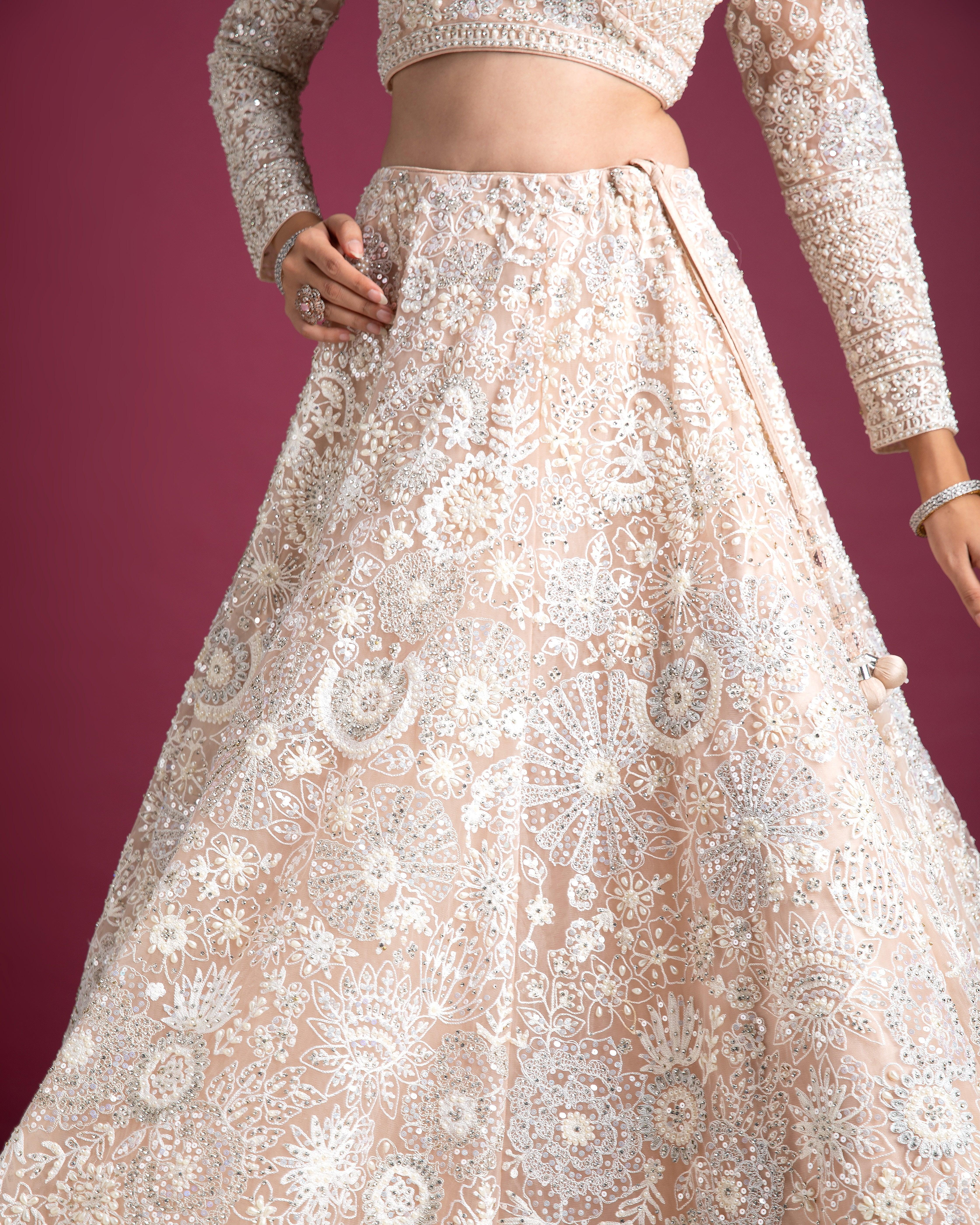 Peach Embellished Bridal Lehenga With Intricate Threadwork - Mokshaa