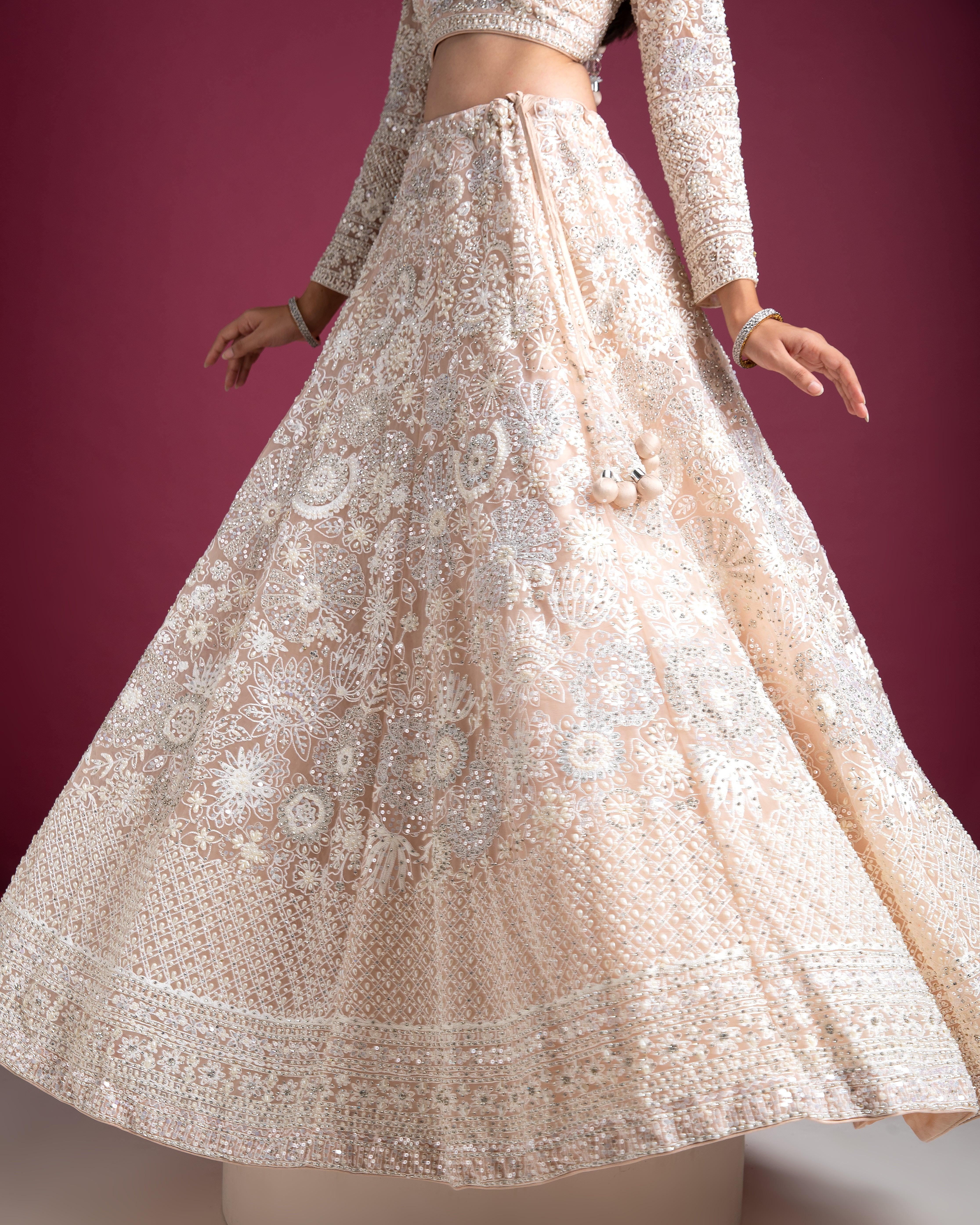 Peach Embellished Bridal Lehenga With Intricate Threadwork - Mokshaa
