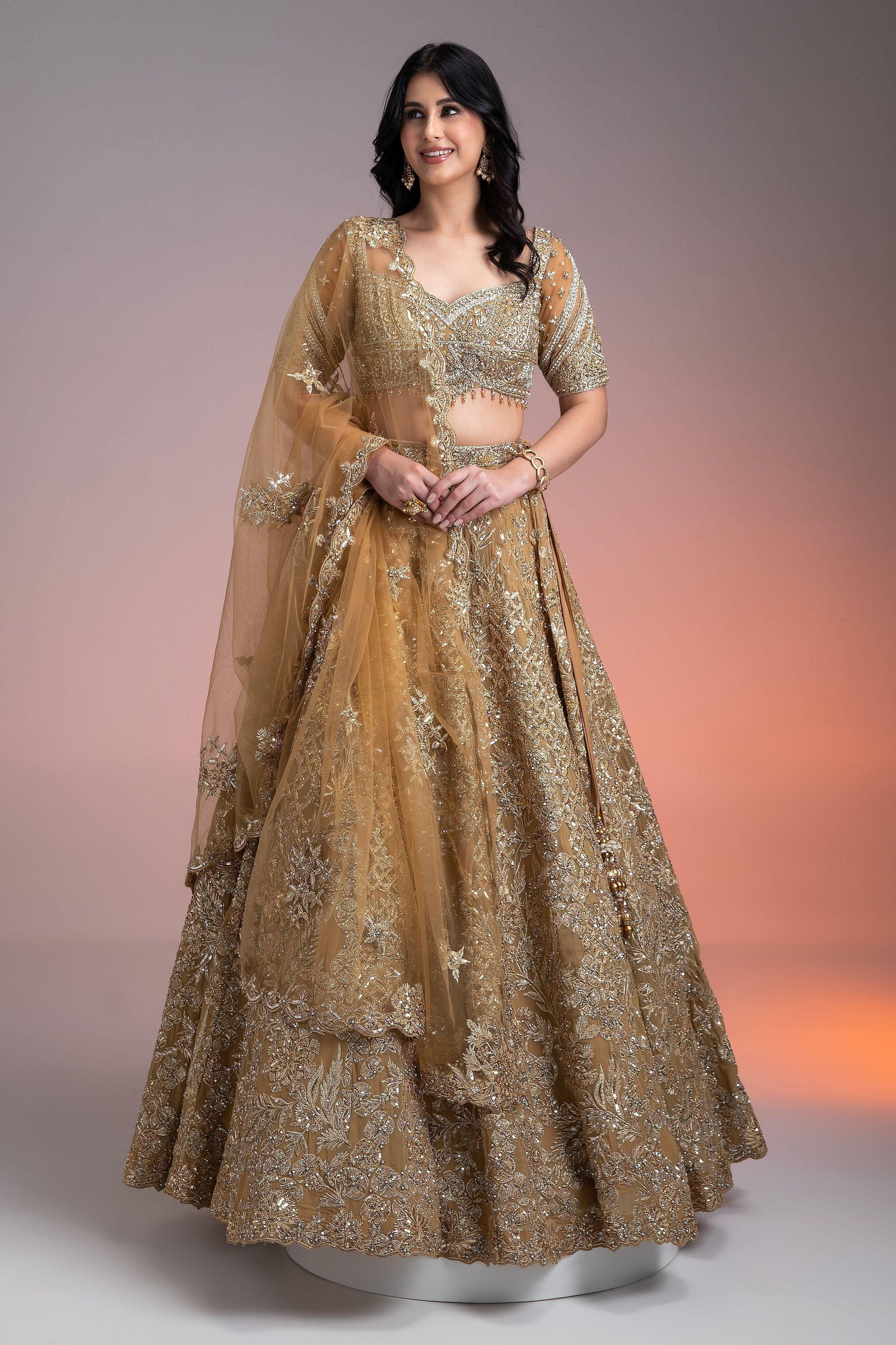 Golden Net Lehenga Set With Intricate Sequin And Thread Embroidery - Mokshaa