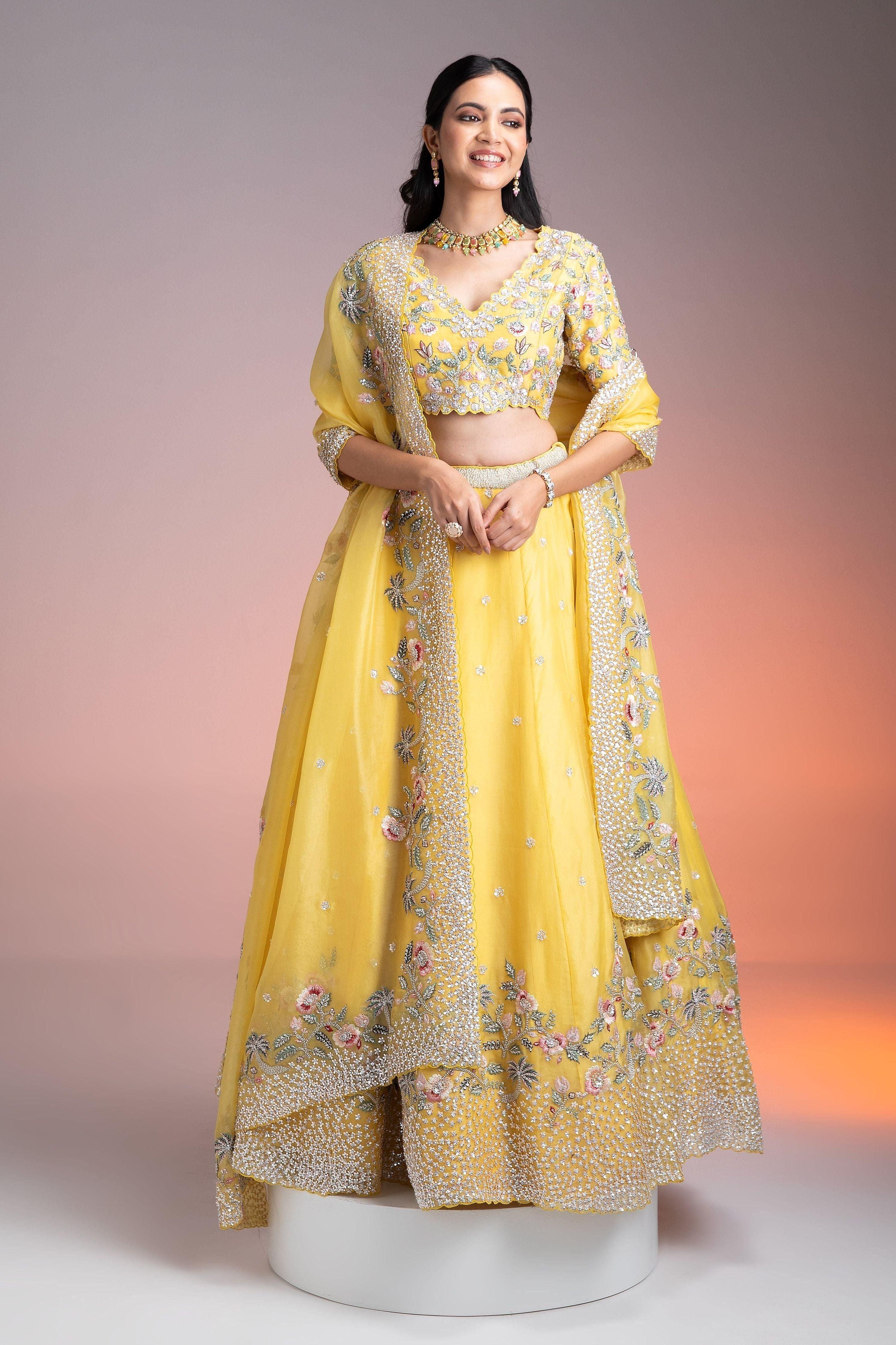 Vibrant Yellow Organza Lehenga With Multicolor Floral Threadwork And Sequins - Mokshaa