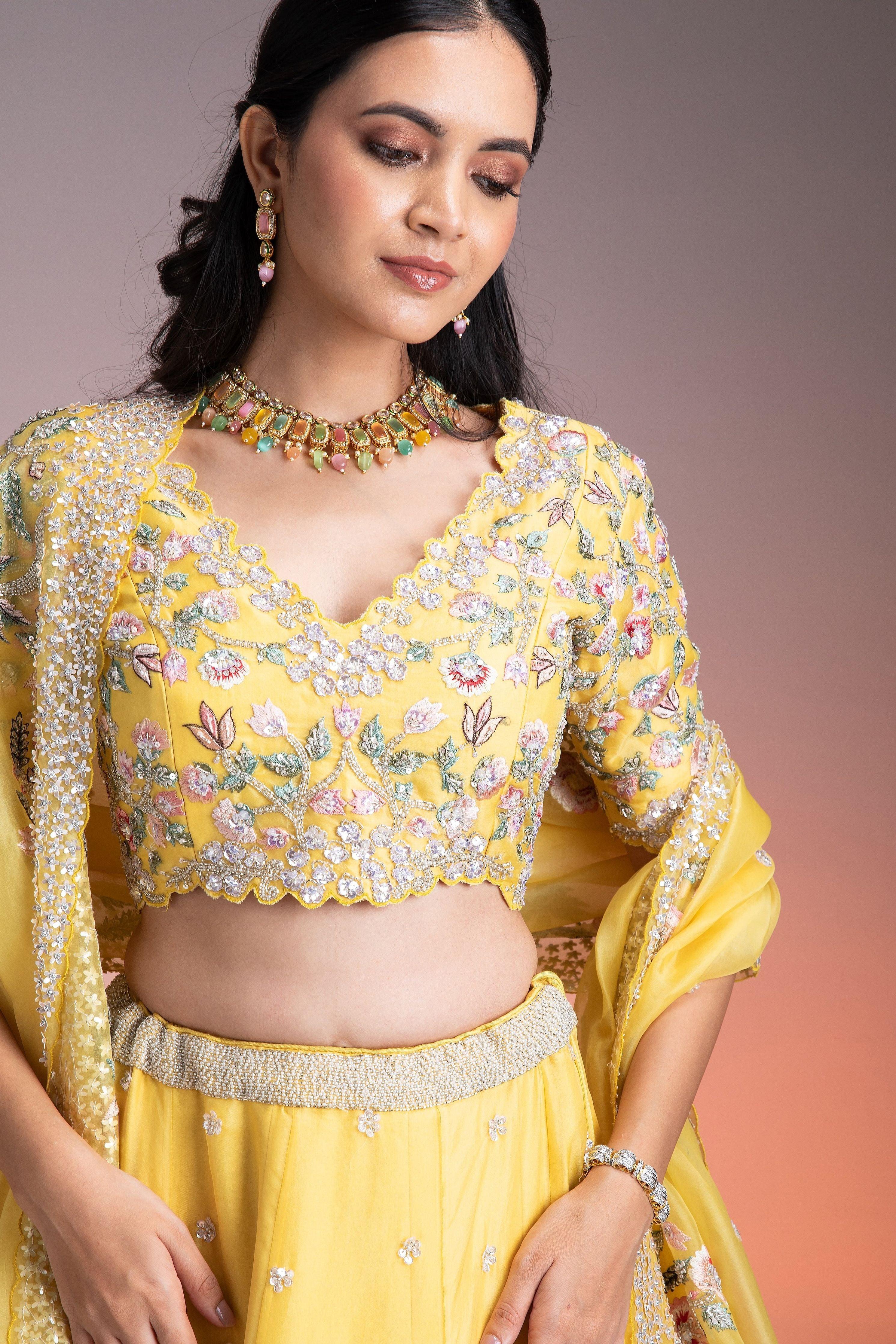 Vibrant Yellow Organza Lehenga With Multicolor Floral Threadwork And Sequins - Mokshaa