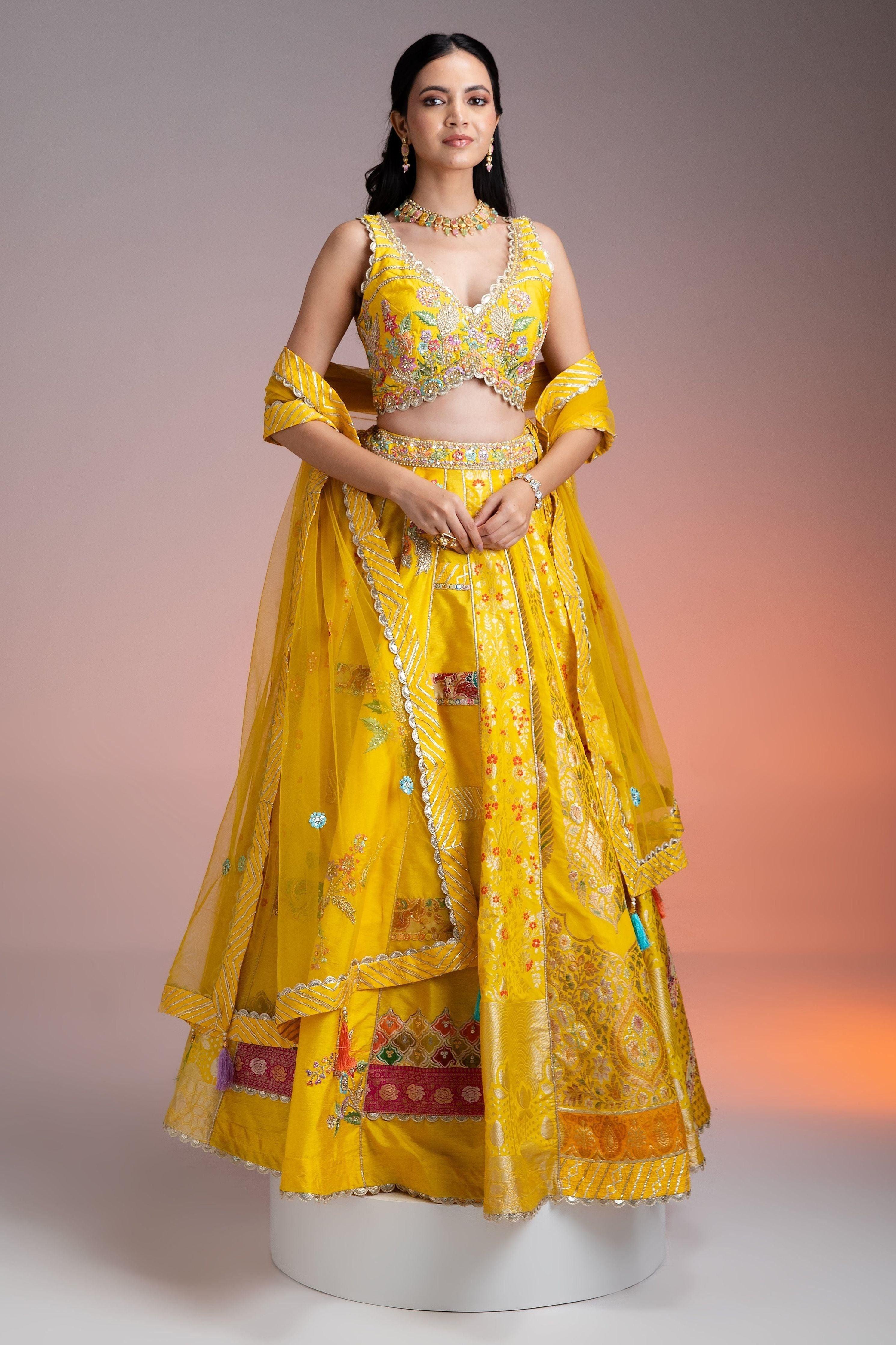 Bright Yellow Silk Lehenga With Multicolor Floral Threadwork And Net Dupatta - Mokshaa