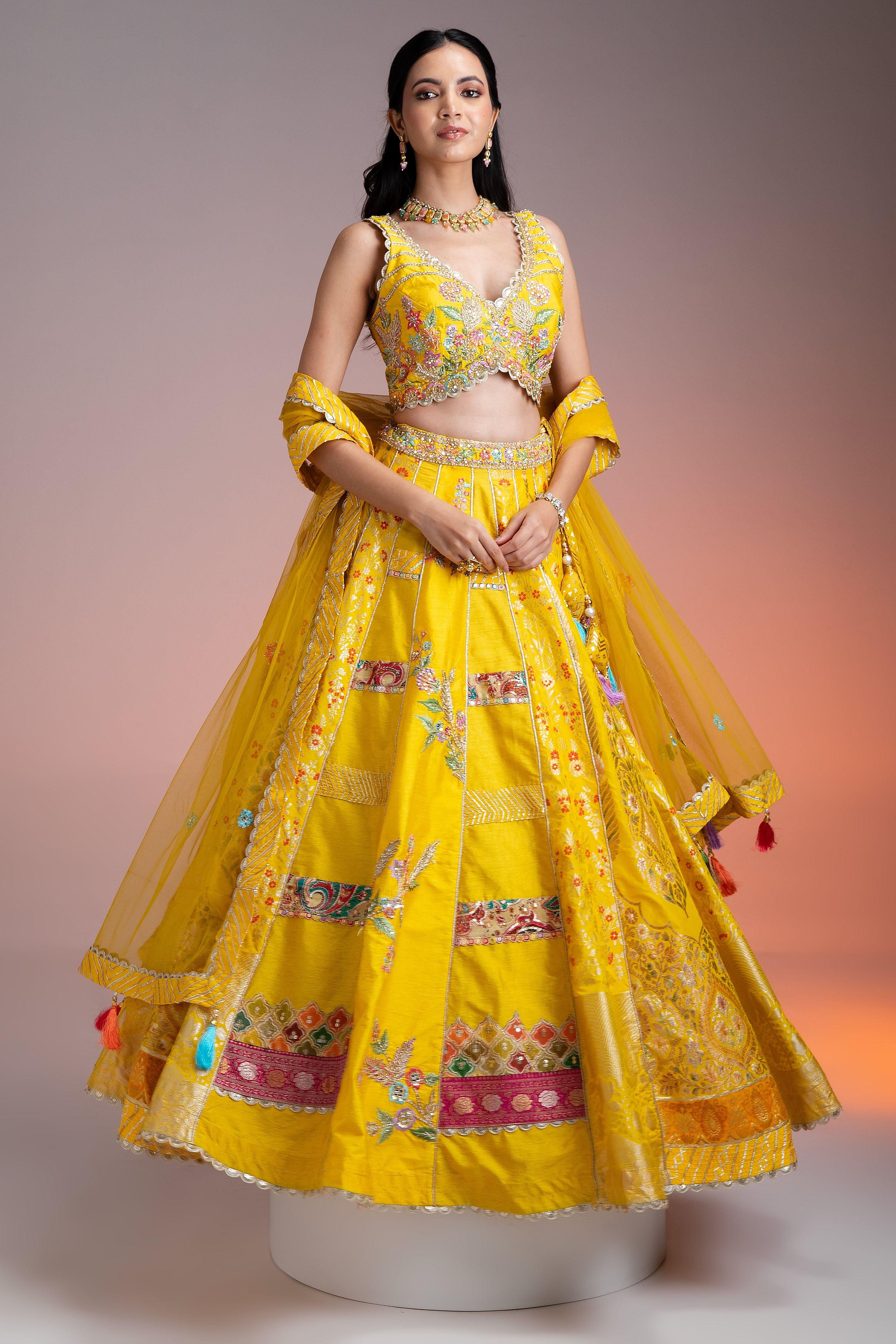 Bright Yellow Silk Lehenga With Multicolor Floral Threadwork And Net Dupatta - Mokshaa