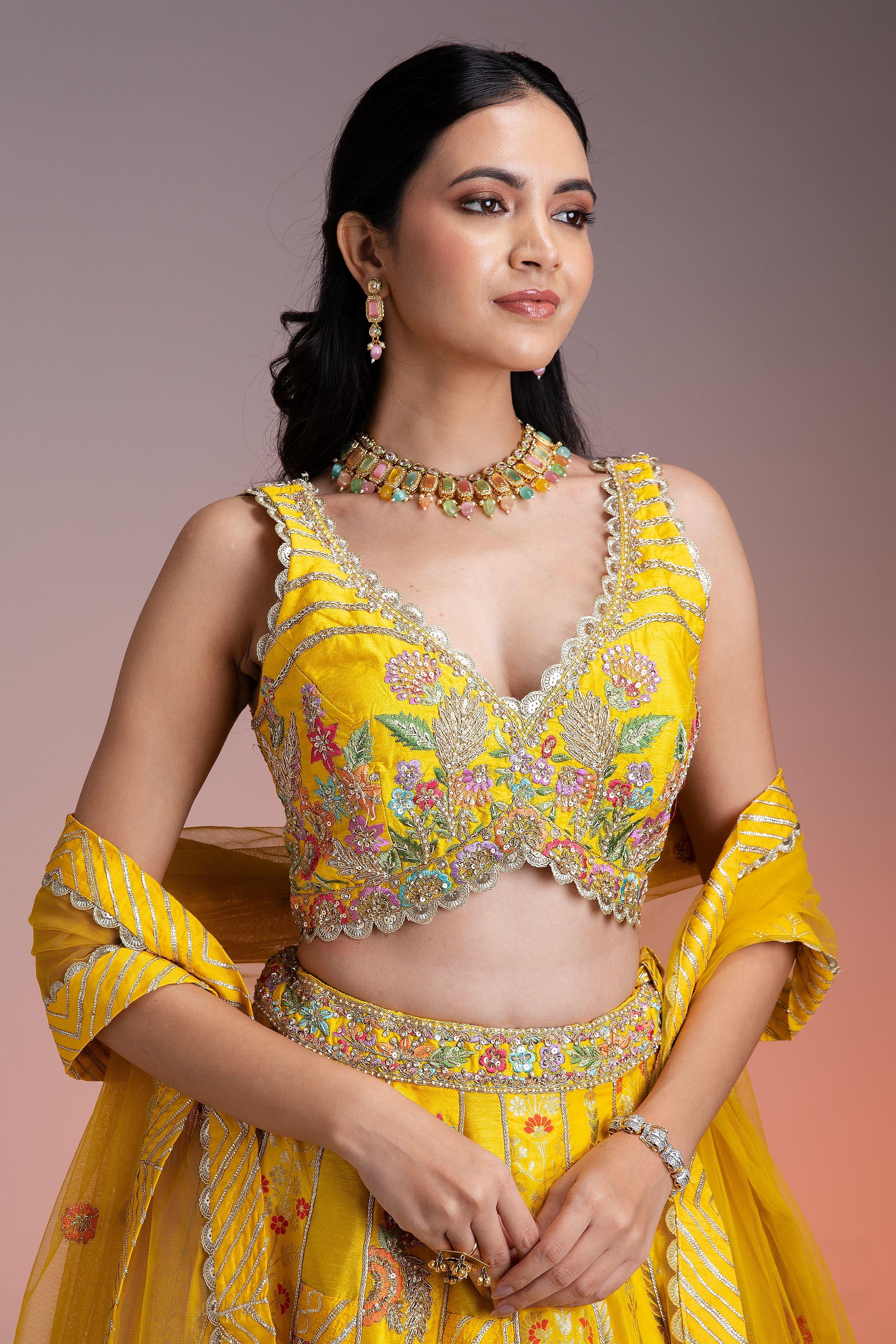 Bright Yellow Silk Lehenga With Multicolor Floral Threadwork And Net Dupatta - Mokshaa
