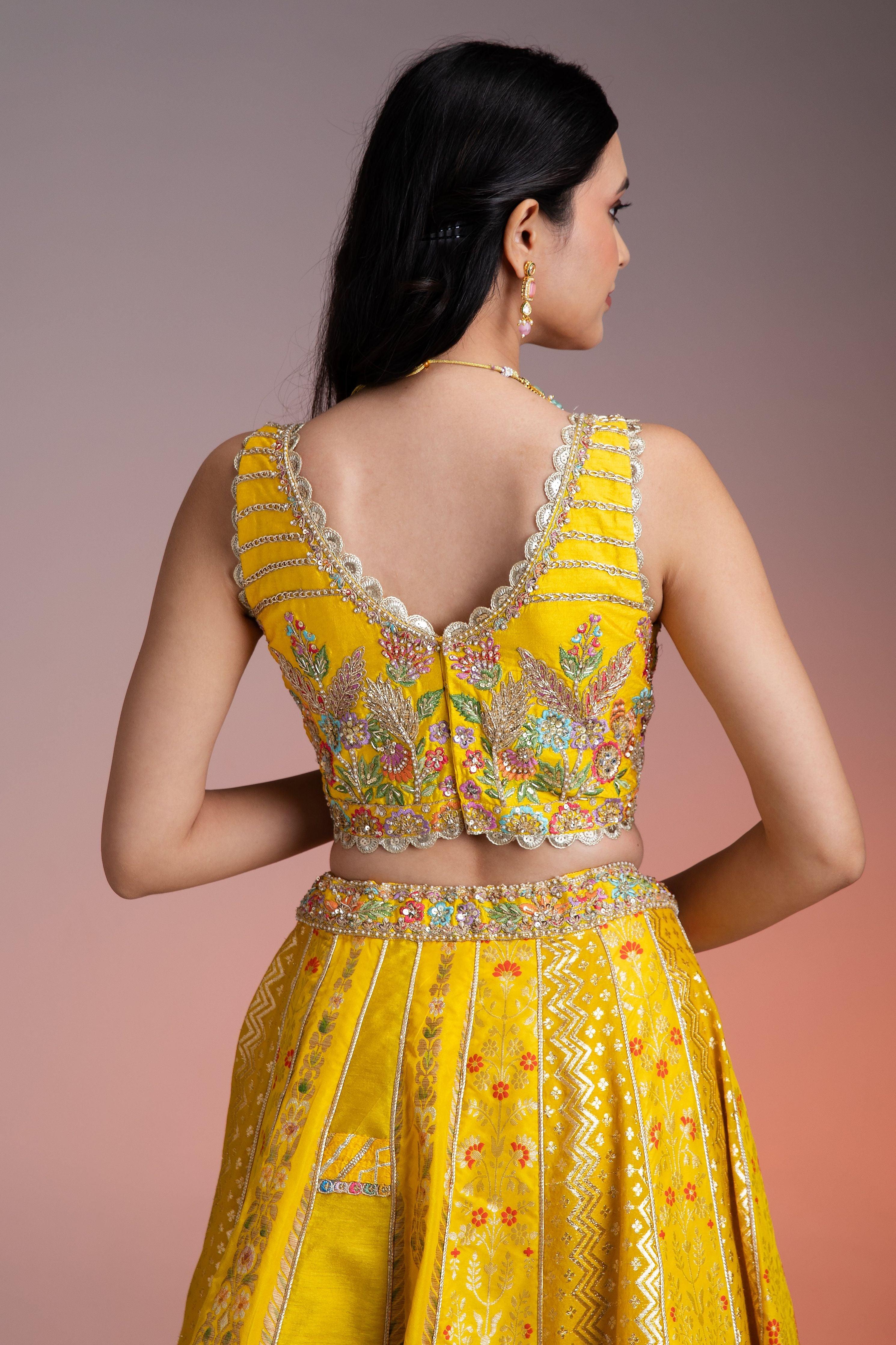 Bright Yellow Silk Lehenga With Multicolor Floral Threadwork And Net Dupatta - Mokshaa
