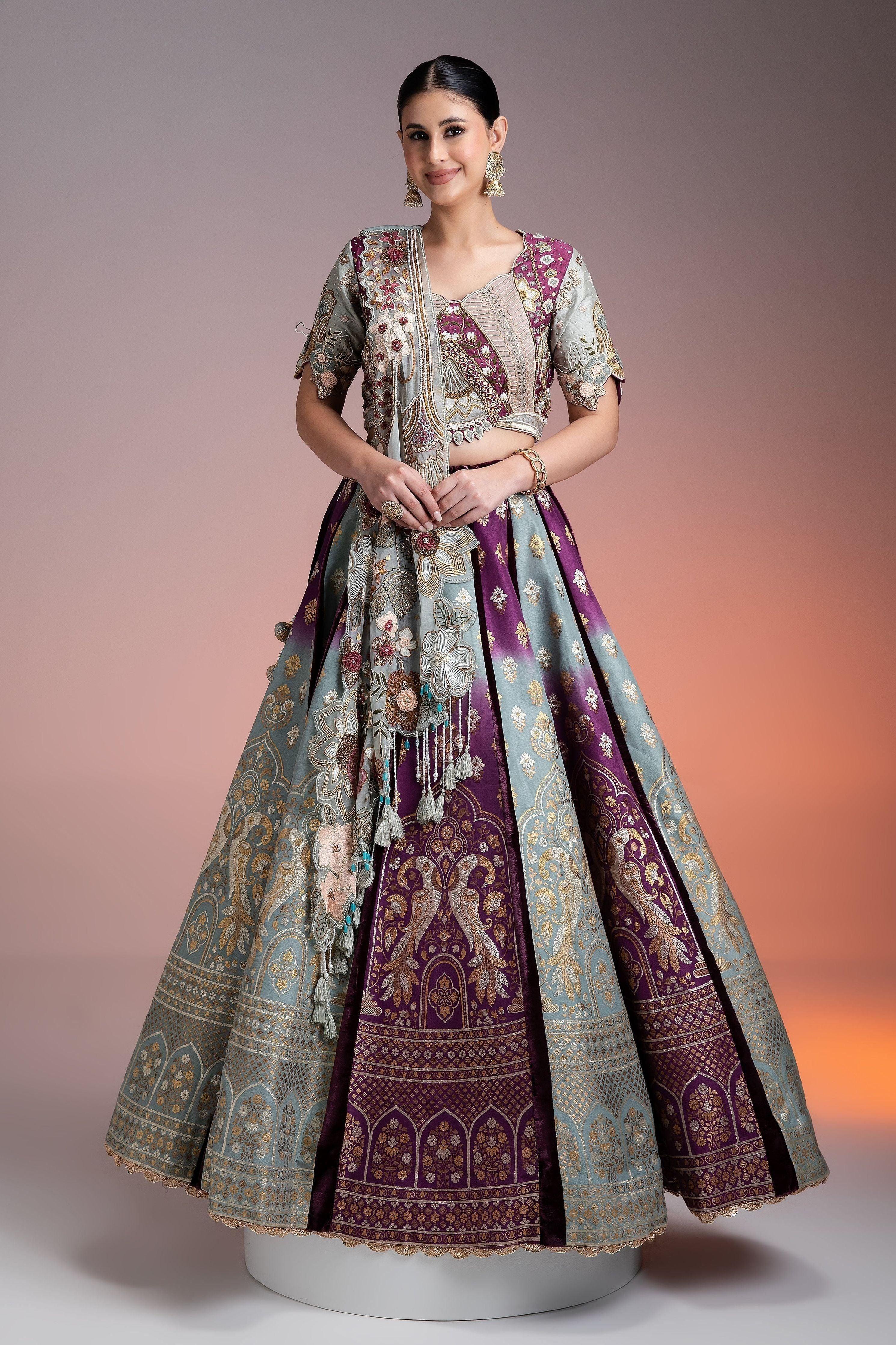 Silk Brocade Lehenga In Muted Pastels And Maroon With Floral Threadwork And Velvet Accents - Mokshaa