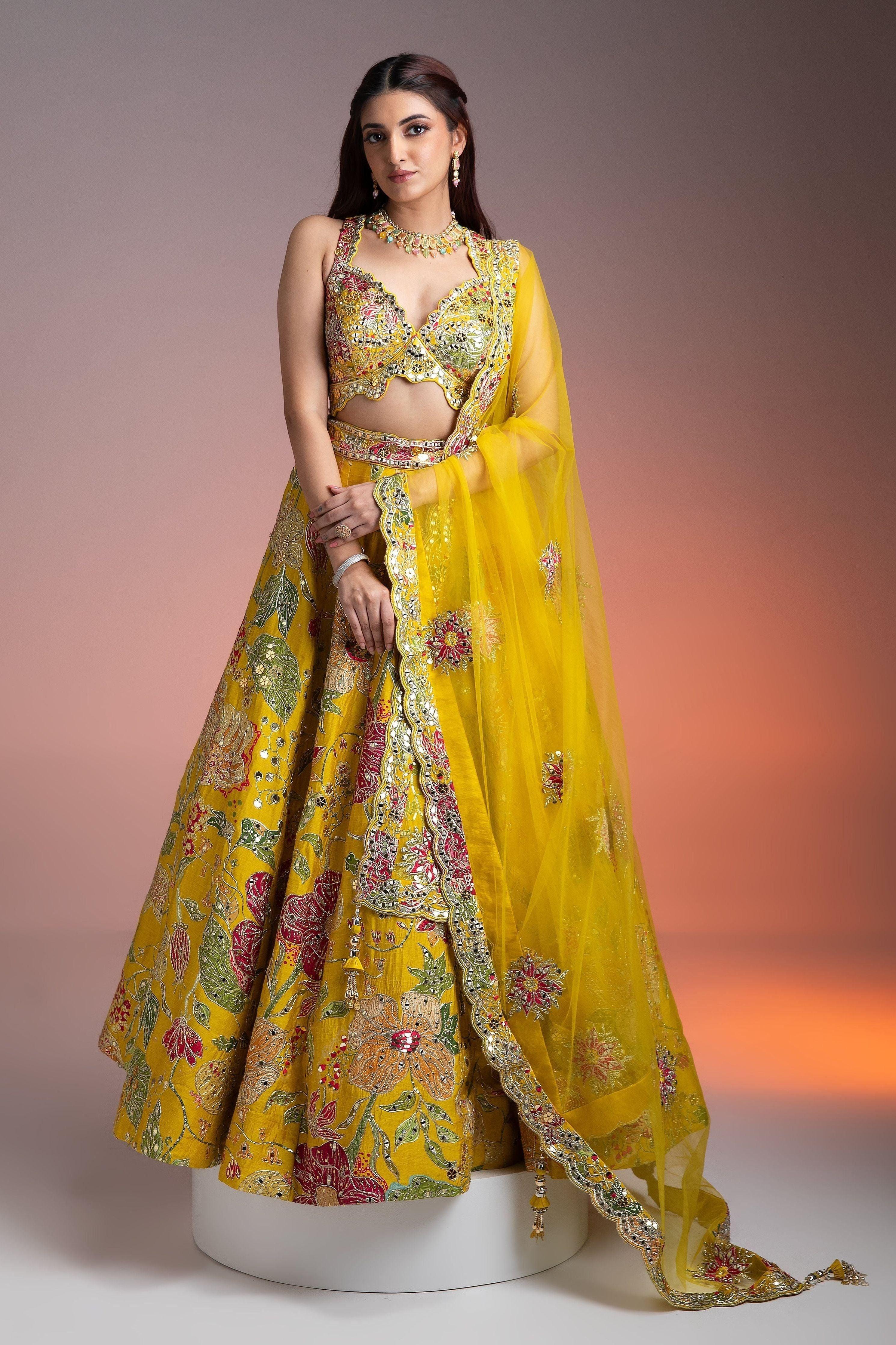 Bright Yellow Silk Lehenga With Multicolor Floral Print And Mirror Embellishments - Mokshaa