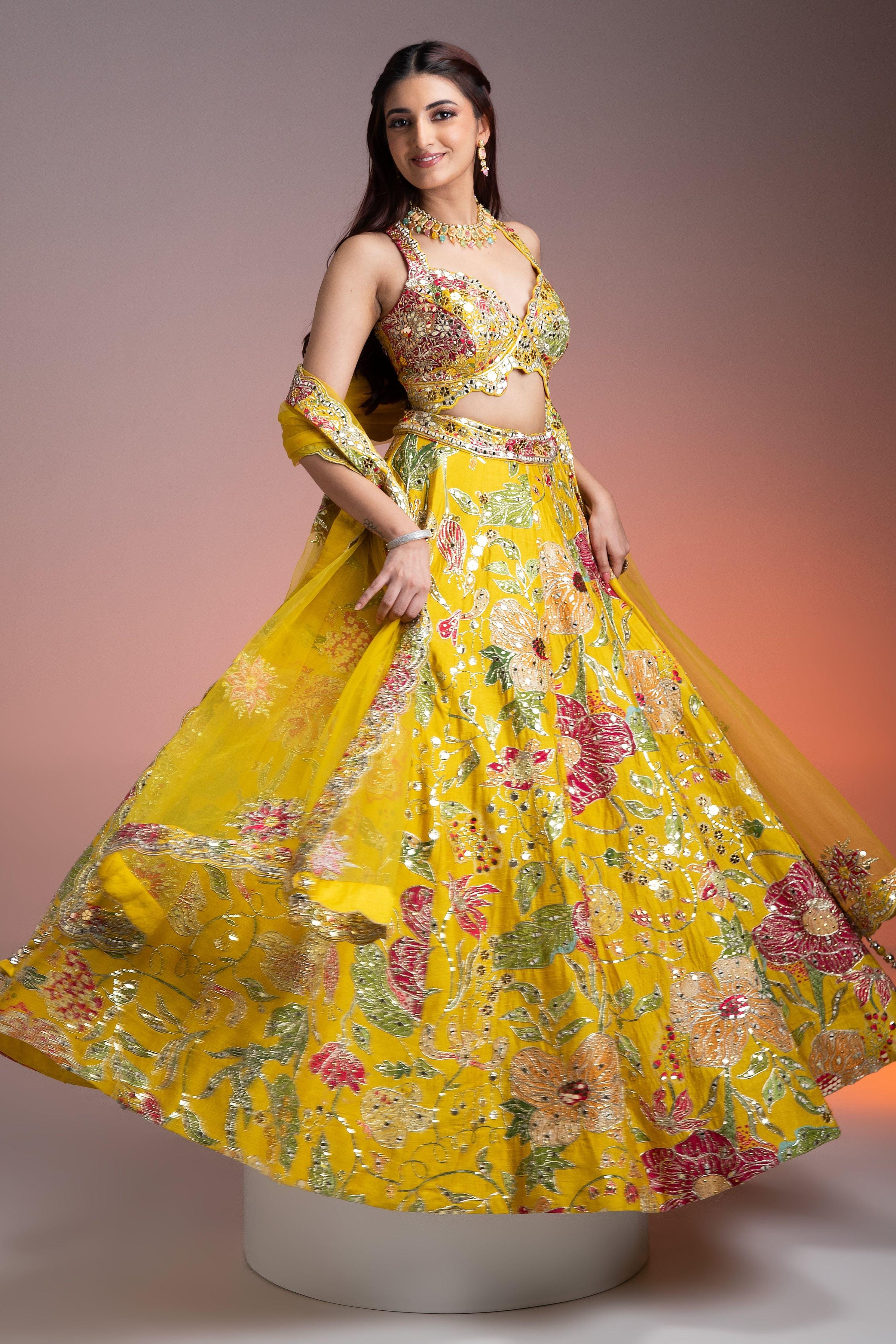 Bright Yellow Silk Lehenga With Multicolor Floral Print And Mirror Embellishments - Mokshaa