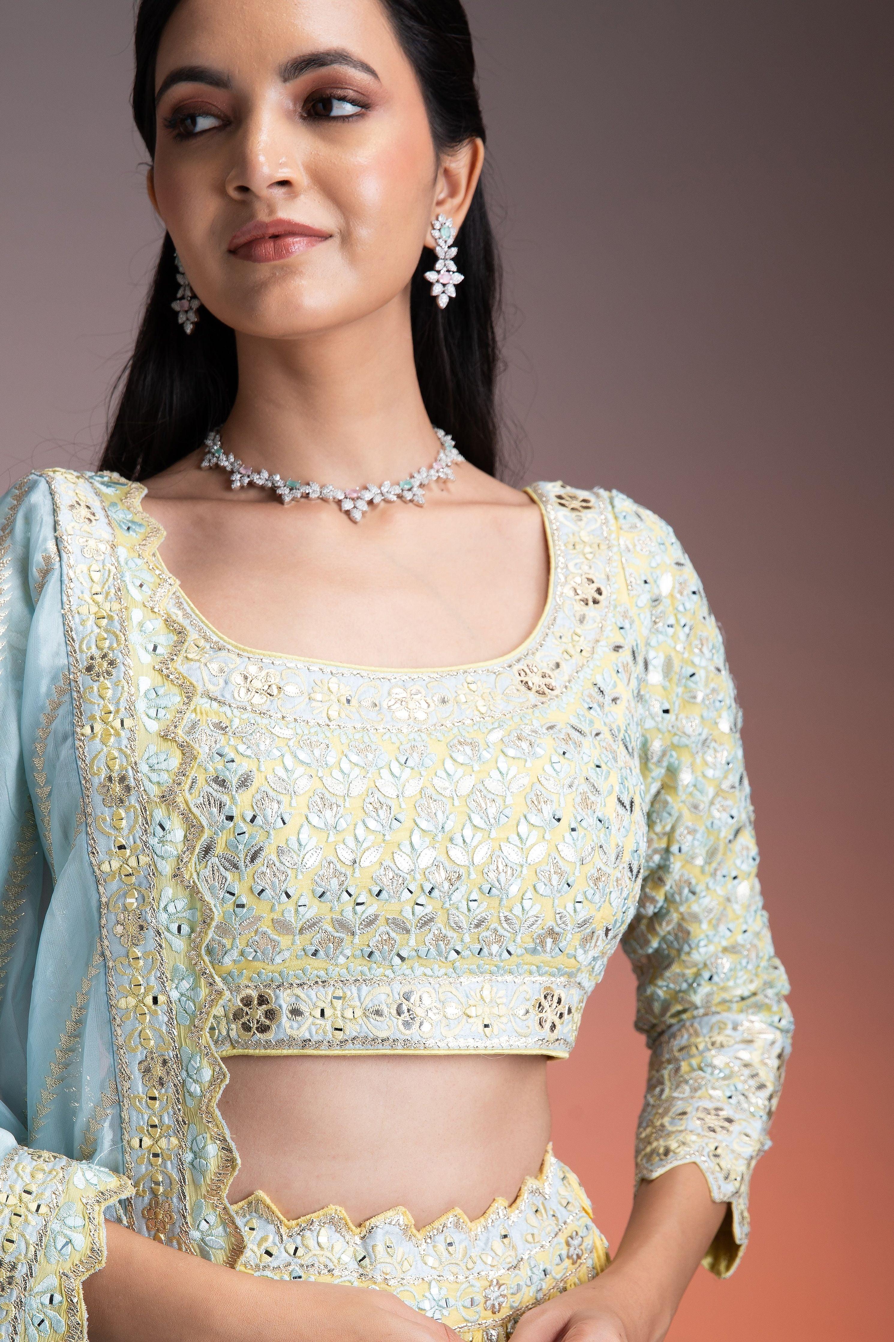 Pastel Yellow Crushed Georgette Lehenga Set With Mirror Embroidery - Mokshaa