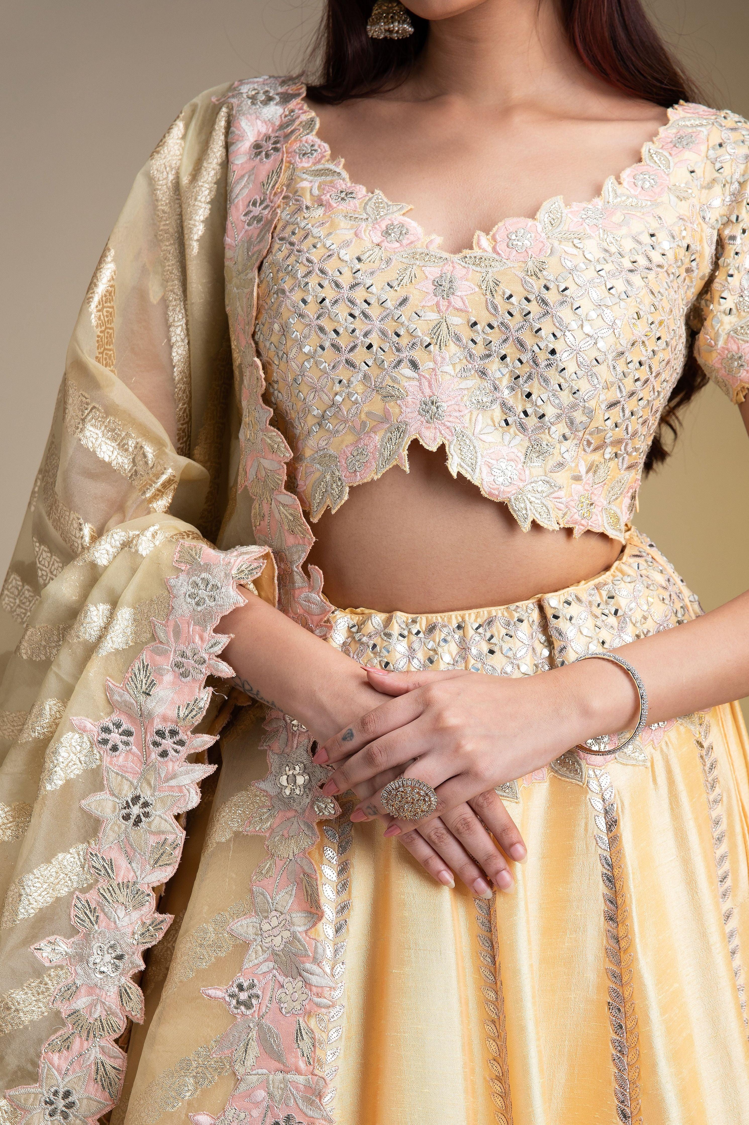 Maize Yellow Silk Lehenga With Pastel Floral Accents And Green Dupatta - Mokshaa