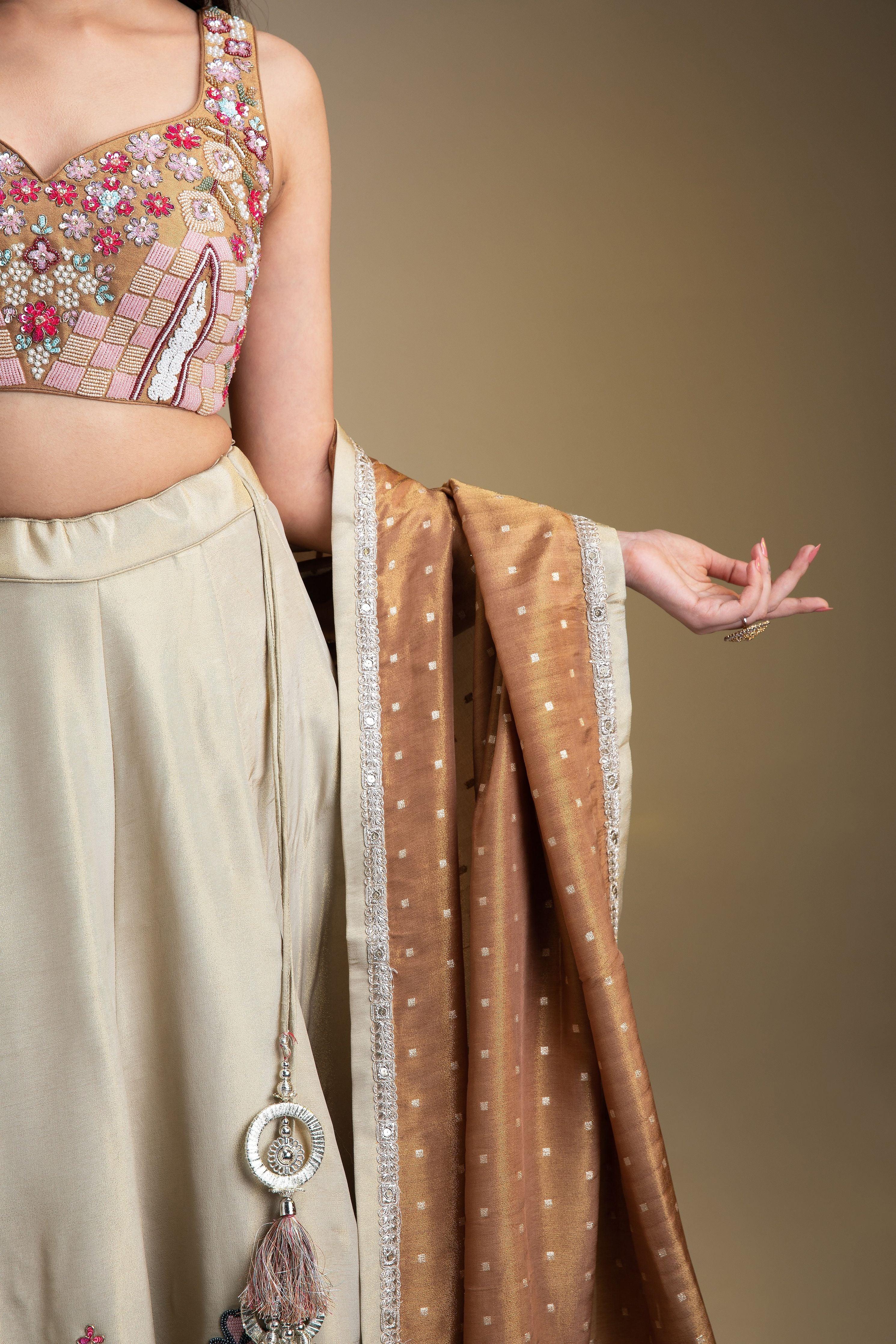 Beige And Copper Silk Lehenga Set With Intricate Floral Embroidery - Mokshaa