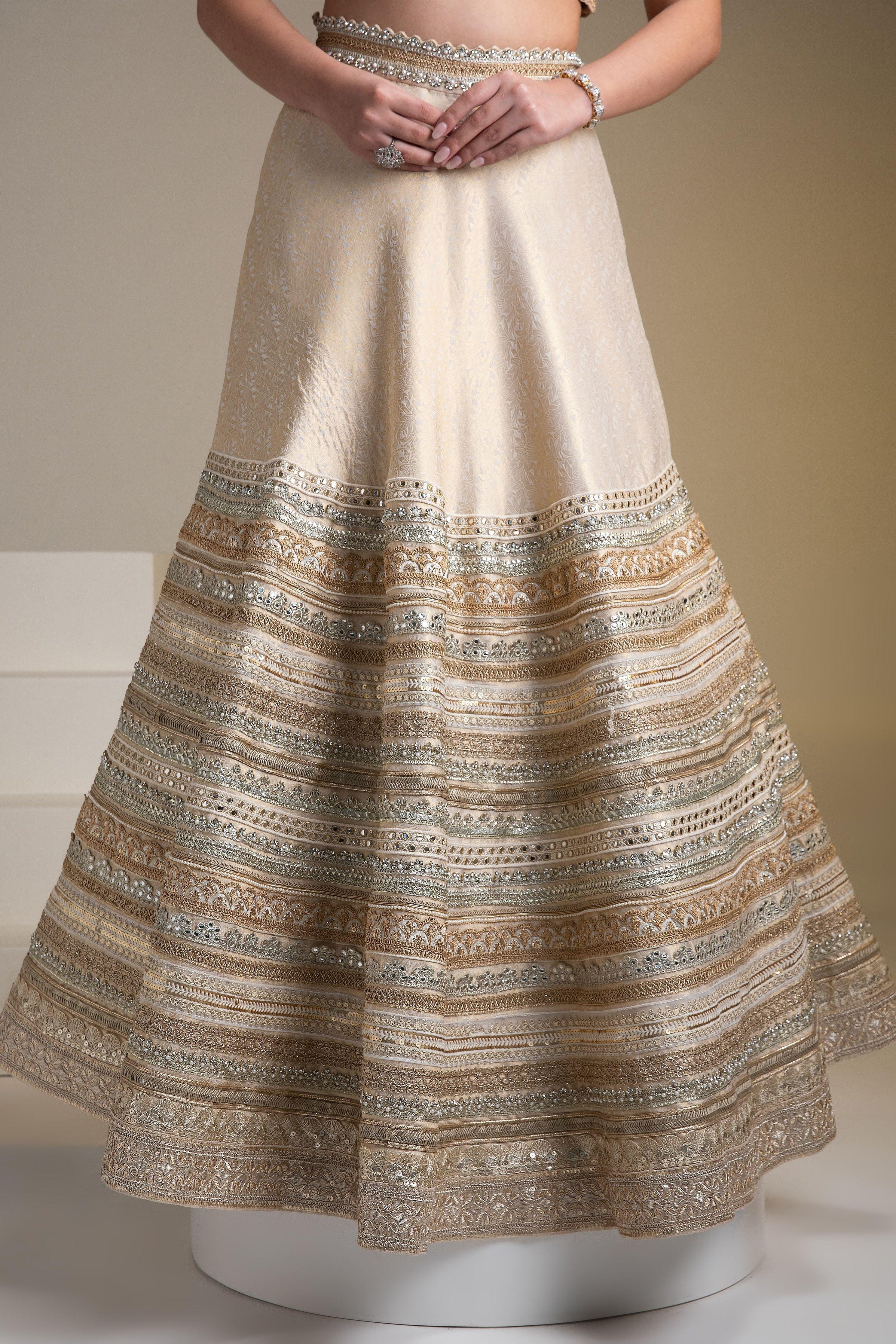 Ivory Banarasi Silk Lehenga Set With Zari And Mirror Detailing - Mokshaa
