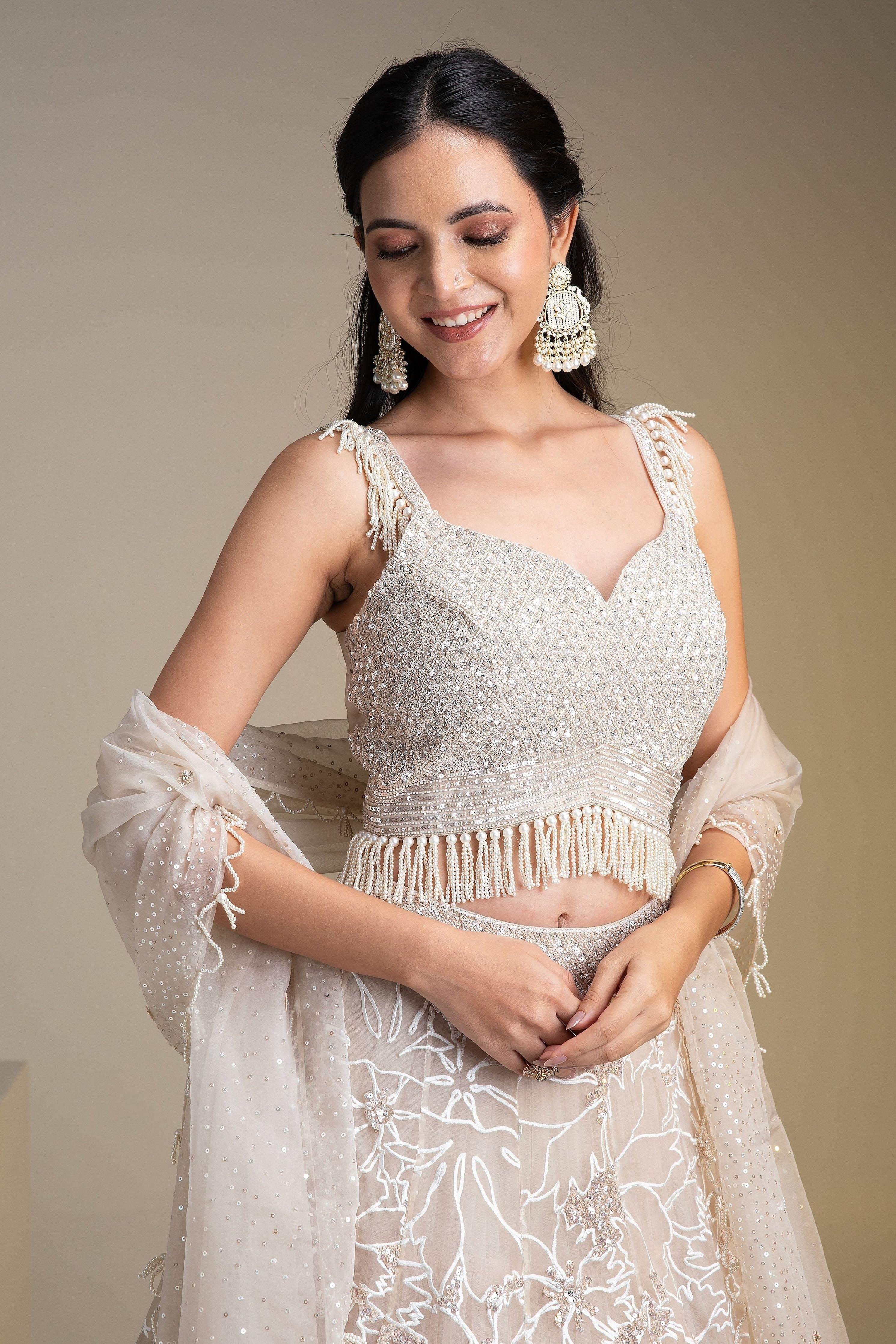 Ivory Organza Lehenga Set With Floral Embroidery And Sequins - Mokshaa