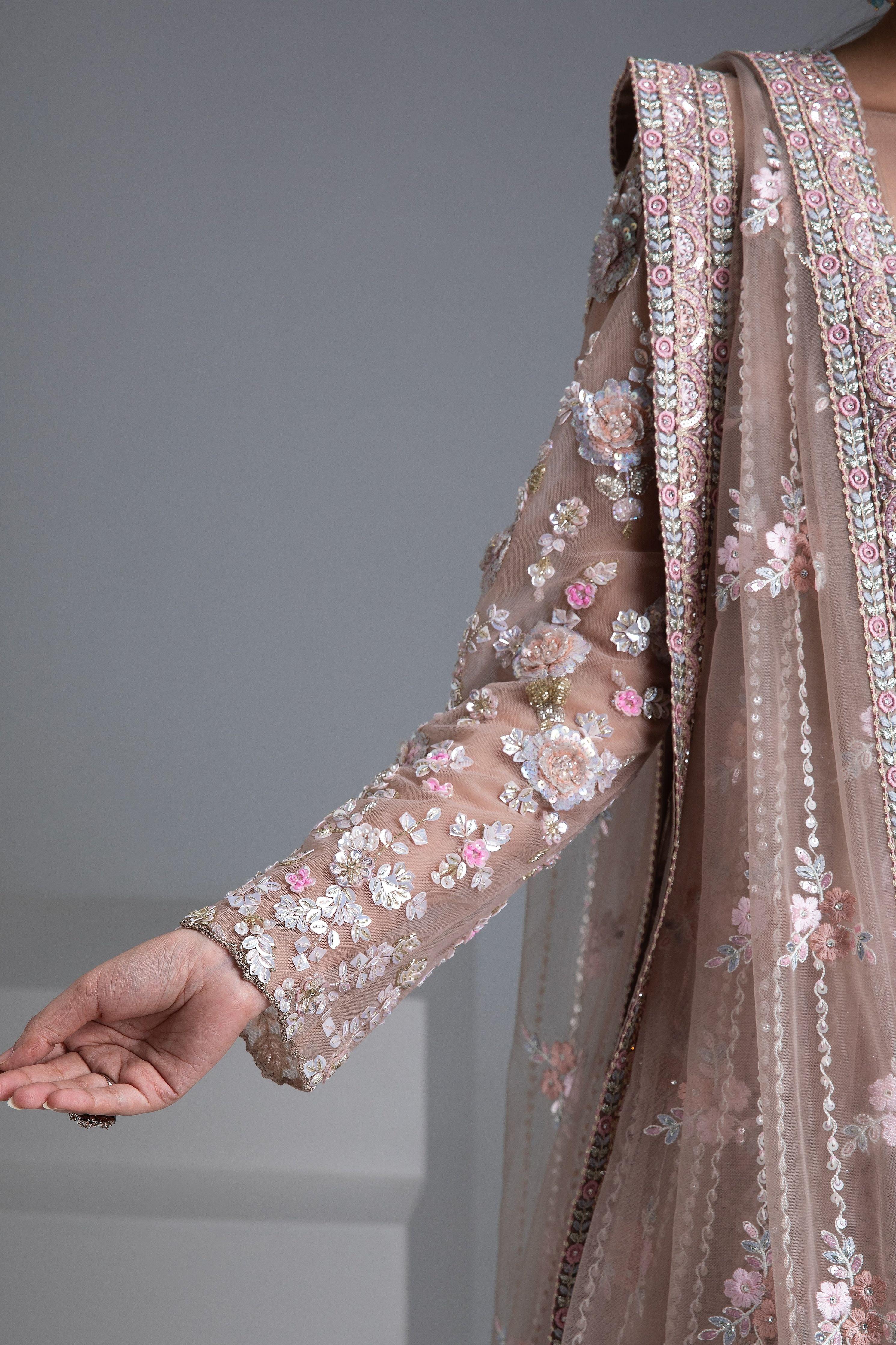 Beige Net Lehenga With Floral Embroidery And Sequin Detailing - Mokshaa