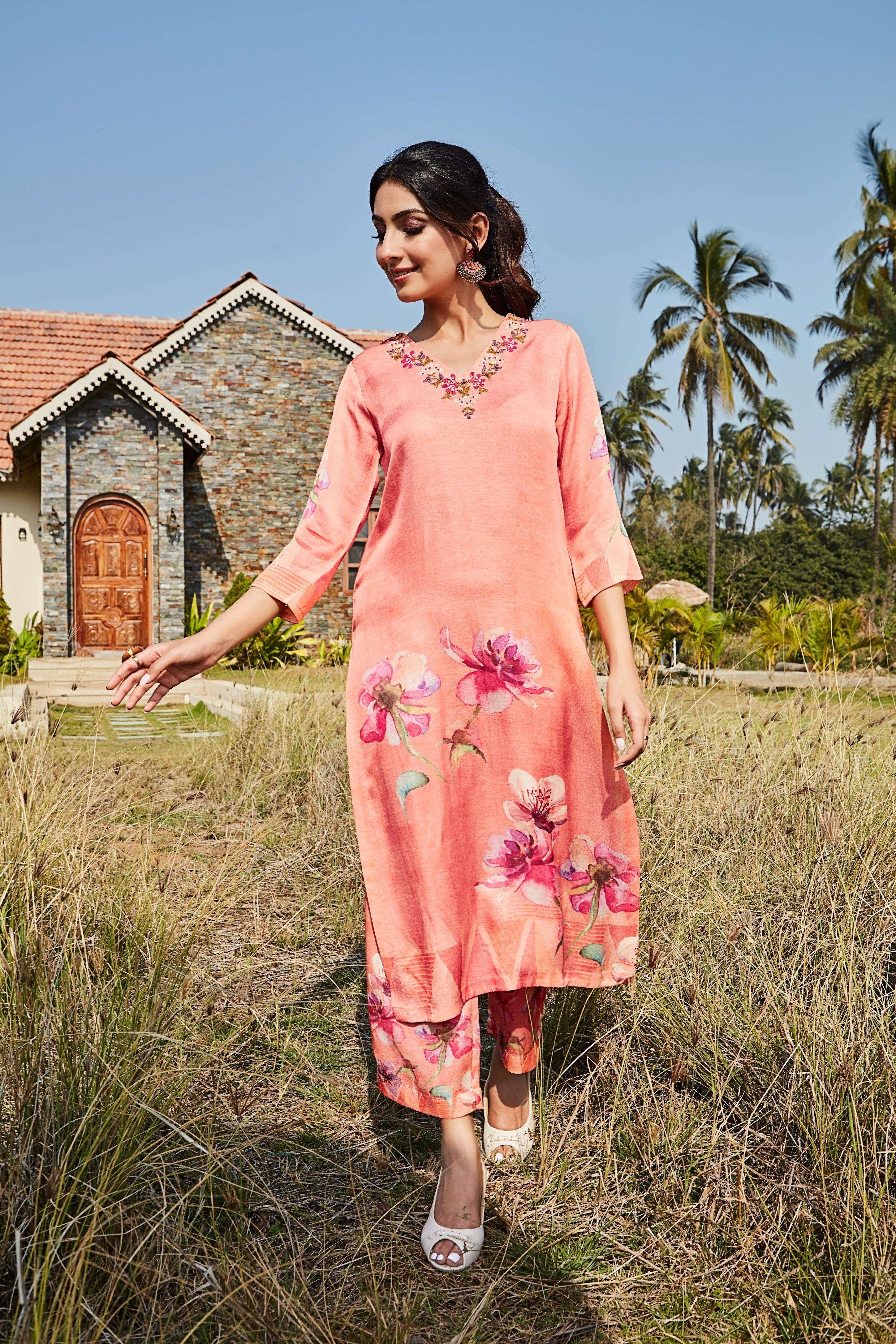 Peach Kurta Set with Bold Floral Prints and Embroidered Neckline - Mokshaa