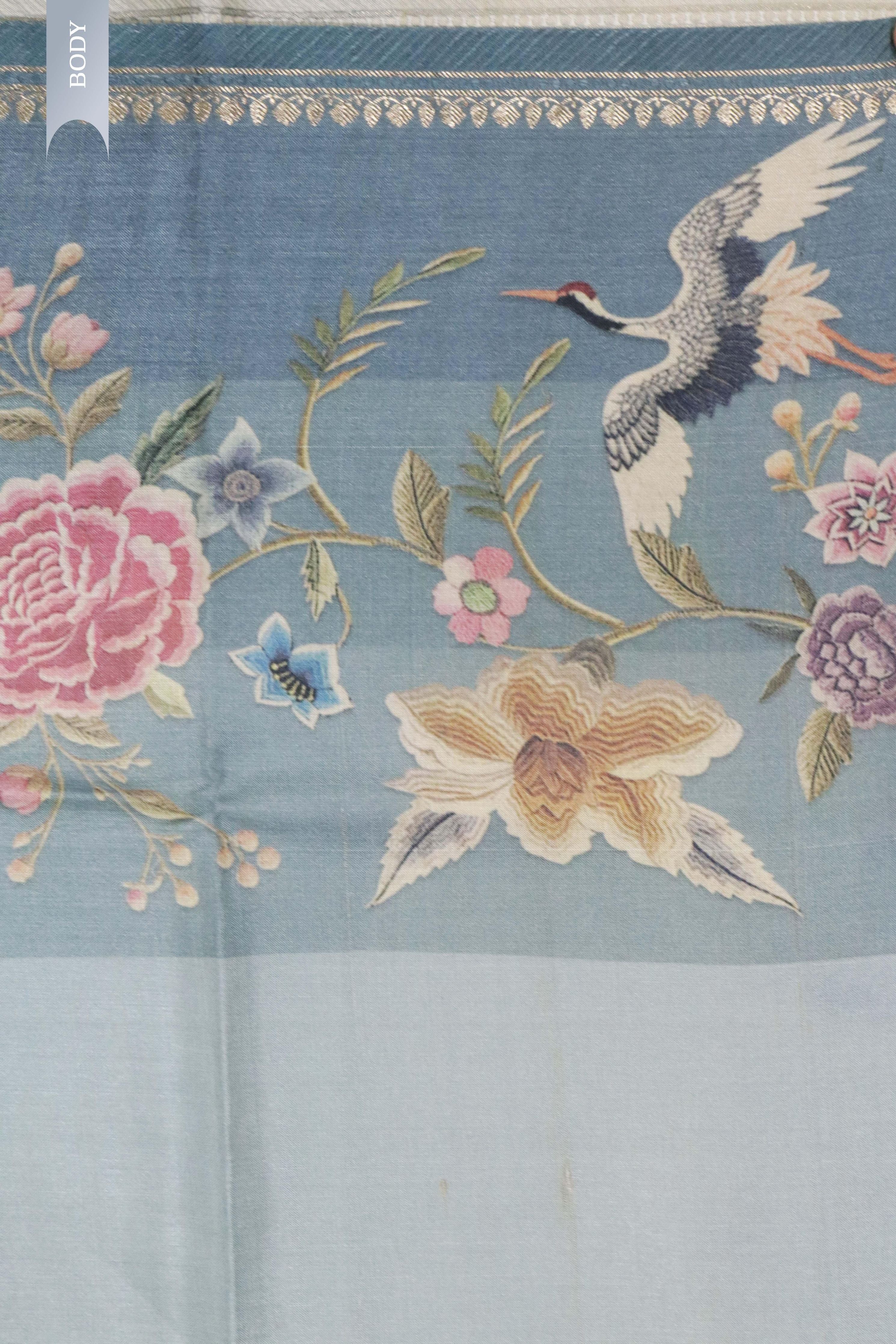 Pastel Blue Tussar Silk Saree with Floral Print & Zari Border - Mokshaa