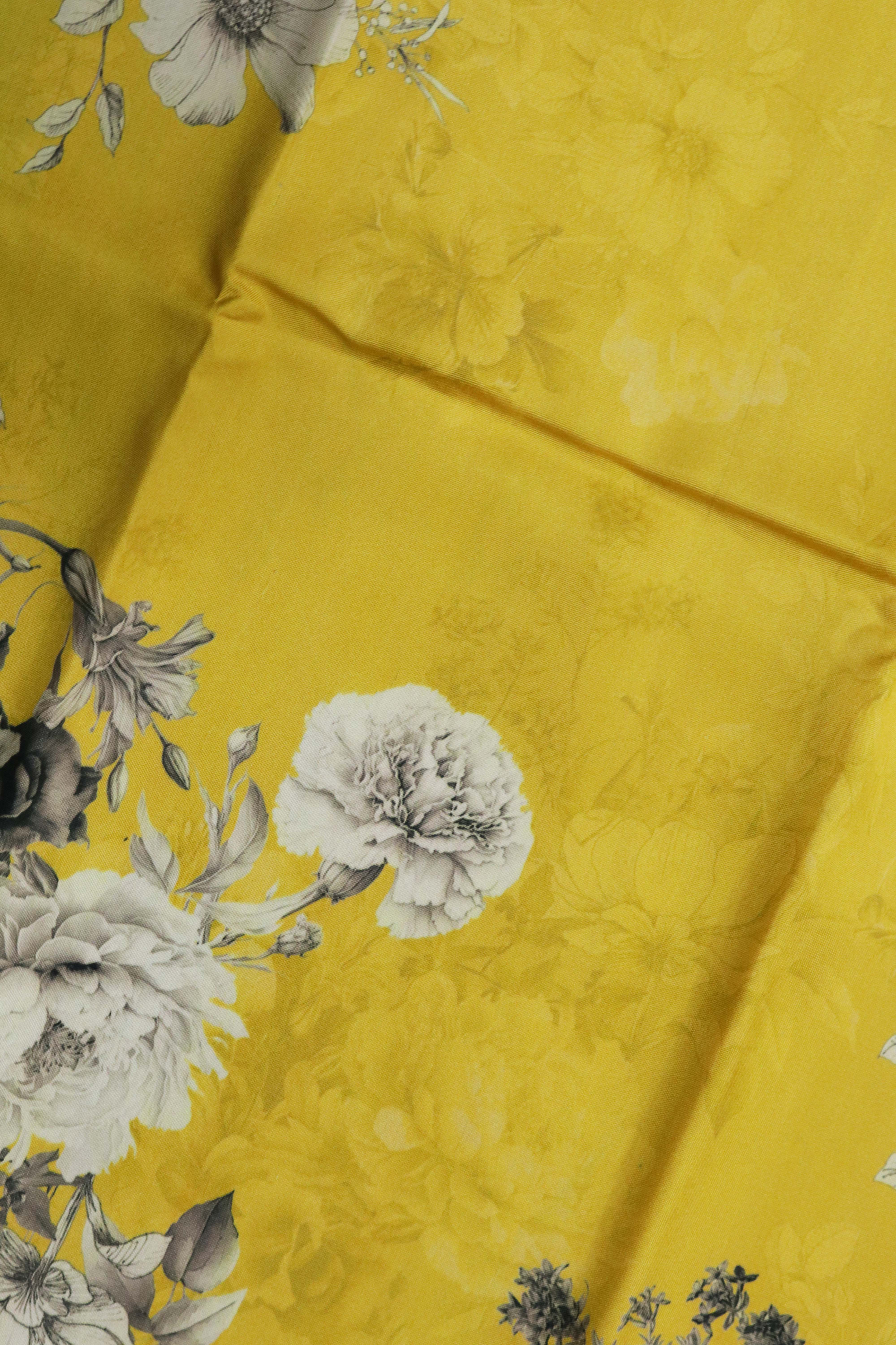Yellow Printed Silk Saree with Ikat Border