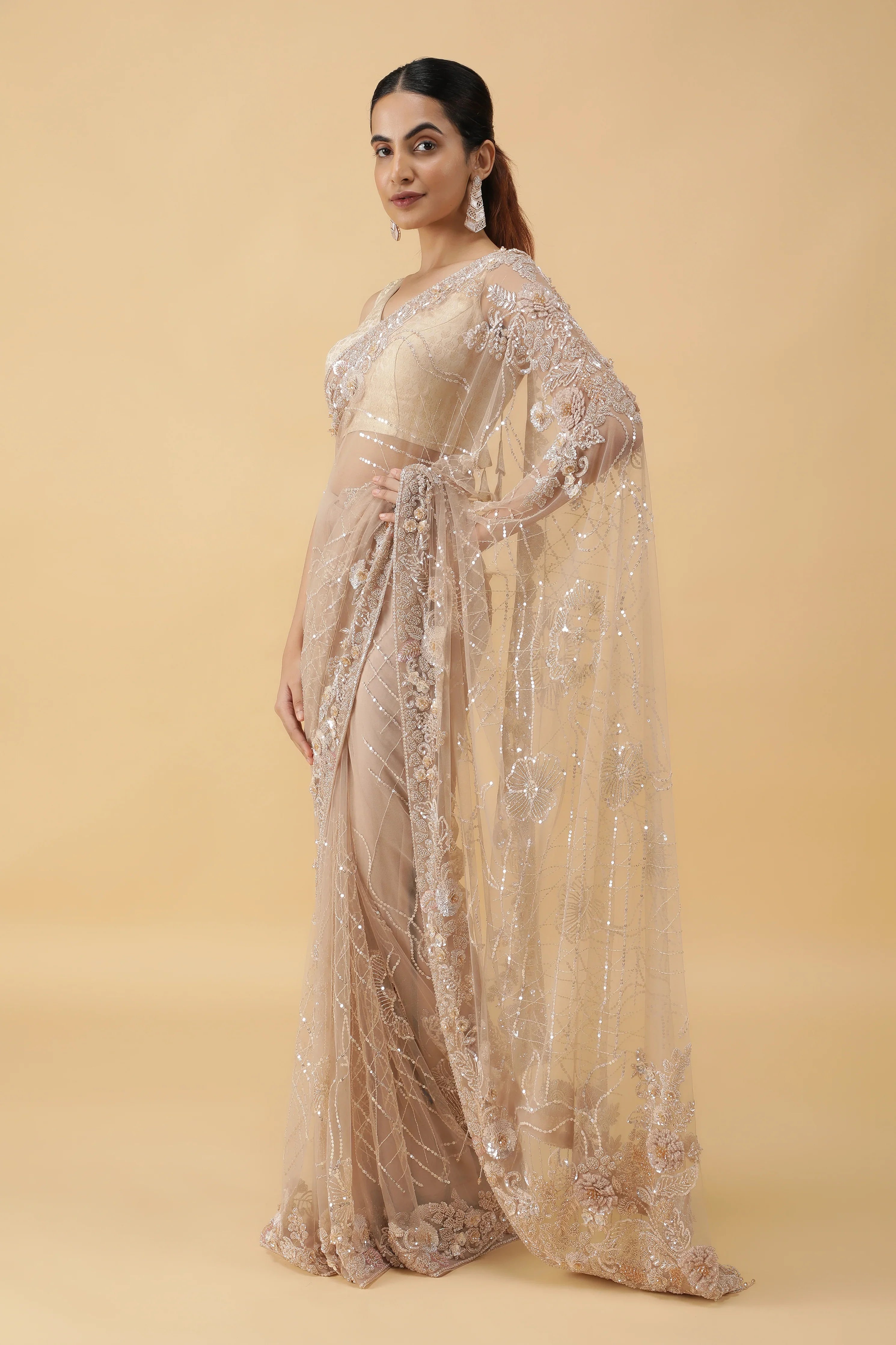 Beige Net Saree with All Over Sequins Work - Mokshaa