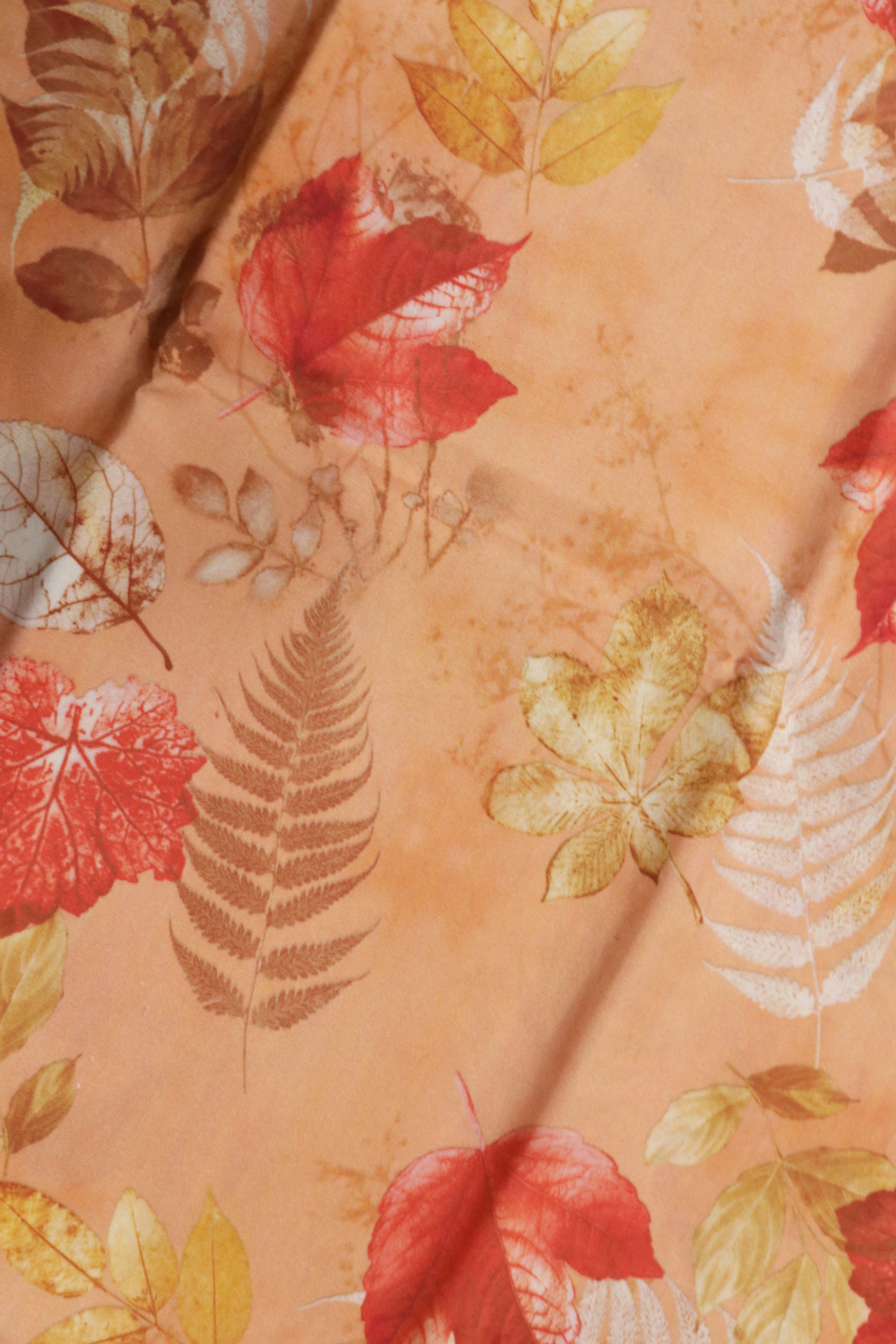 Orange Printed Silk Saree with Ikat Border