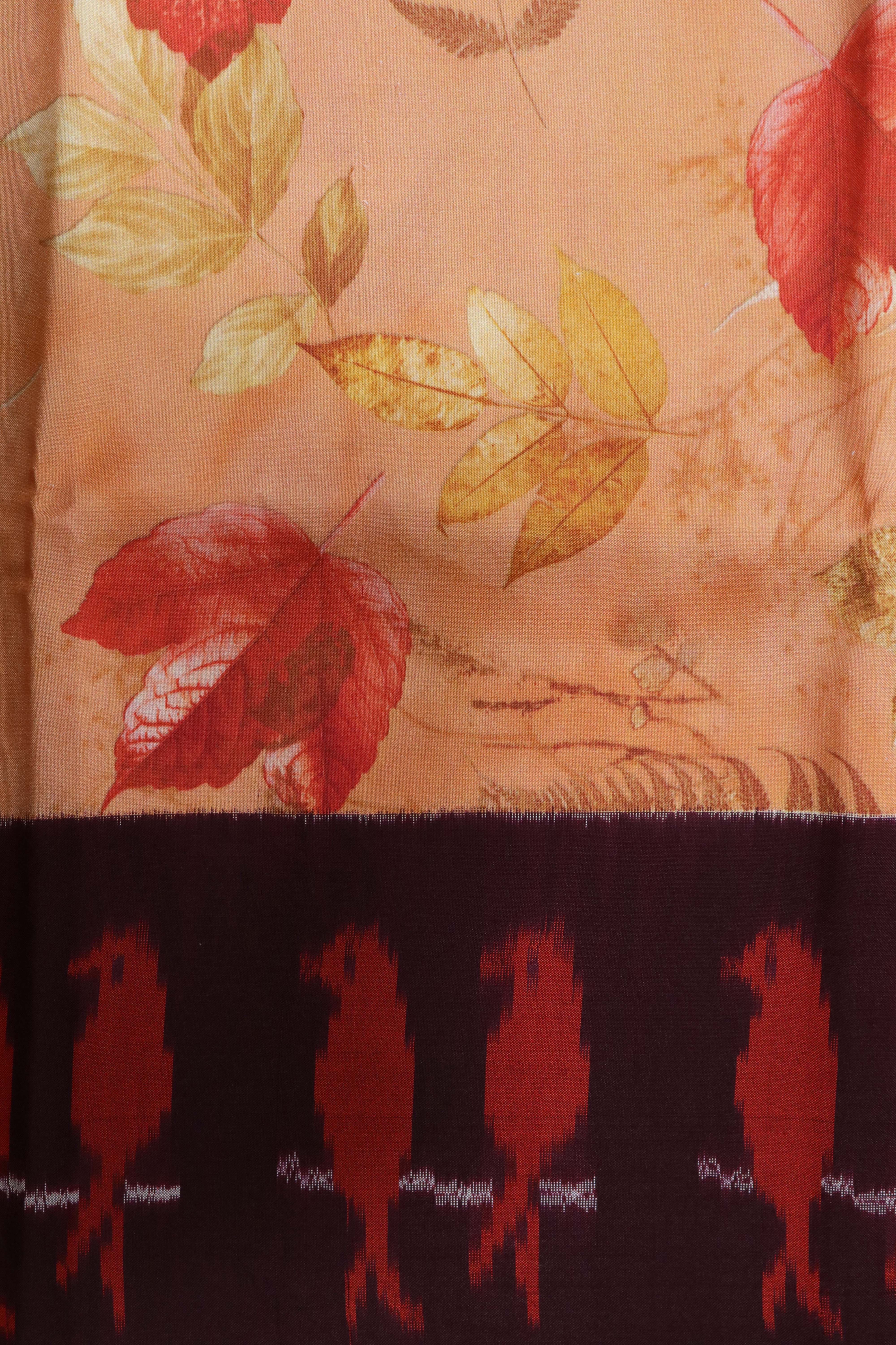 Orange Printed Silk Saree with Ikat Border